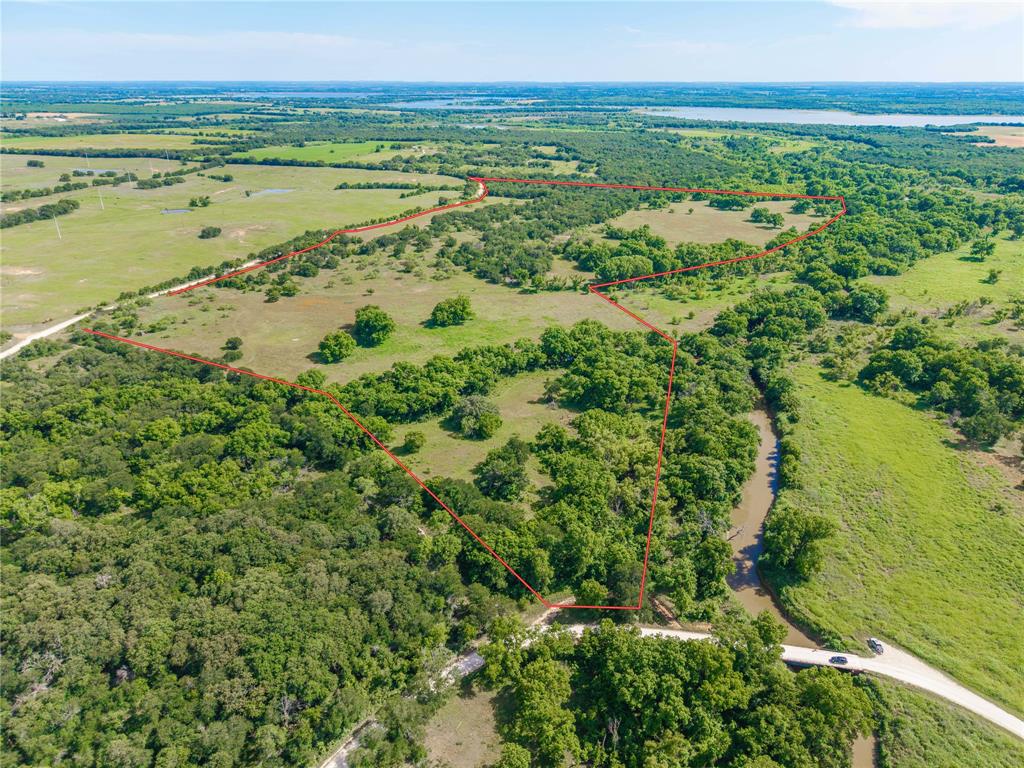 • 
• First time offered for sale; This ranch has been in the Sanders - Chandler family since 1936!!  
• 
• 92.195 Acres of bottomland near De Leon with over one-half mile of shared boundary next to the restricted Upper Leon Wildlife Management Area. (Note: The property line does not go to the Leon River, the river itself is entirely on the management area.) The wildlife management area only allows small game and wild hog hunting, so this property is a hunter's paradise with the abundant Whitetail deer, wild turkey, hogs and other wildlife.  
• 
• The land includes about 70 acres which is in the US Corps of Engineers Lake Proctor flowage easement flood plain, so there can be water on the land occasionally. (see attached topo map) The bottomland has numerous huge Pecan trees scattered throughout, and the rolling terrain is just beautiful.  
• 
• The fences are new on the north boundary and along the west side where it joins the wildlife management area, + part of it along CR 434 is also a newer fence.  
• 
• Property has a very small amount (about 75-100') of frontage next to the bridge on CR 446 and there is also a gate there. Small stock pond and a fair but usable cattle pen.  
• 
• There is also a small cement crossing and dam on Mill Branch which holds water and is a wildlife attraction.  
• 
• Call us to see this unique, hard-to-find recreational ranch!!