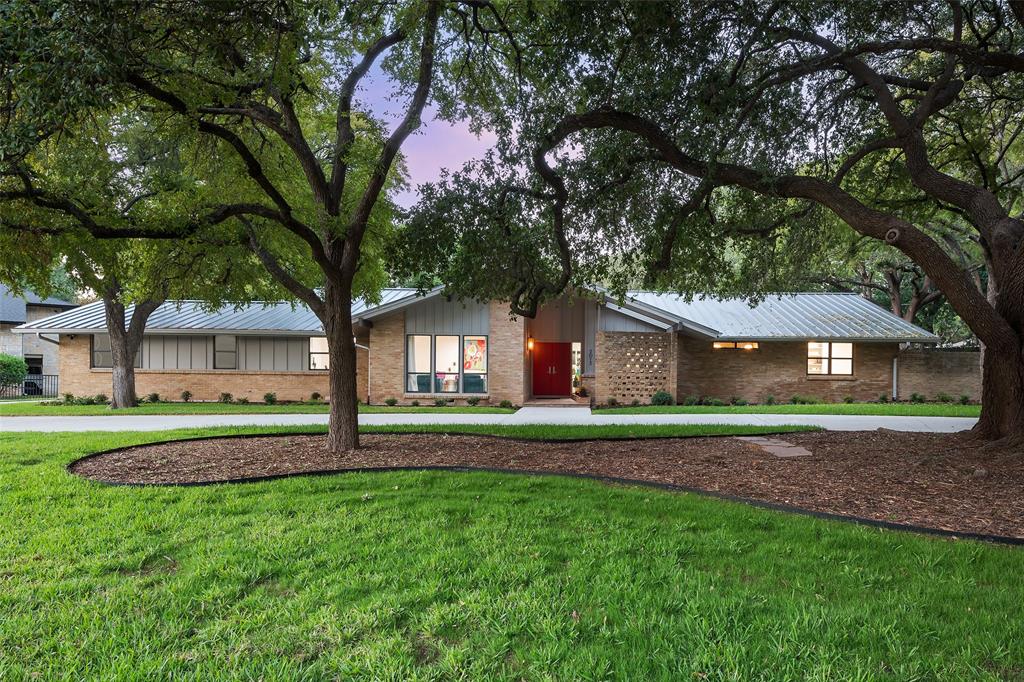 Set on a quiet cul-de-sac, this stunning one-story Mid-Century Modern home sits on a lush 0.67-acre lot & has been tastefully updated. The thoughtful floor plan flows effortlessly between living & entertaining spaces, showcasing iconic features like exposed beams & skylights. At the heart of the home is the gourmet kitchen, featuring Montclair Danby honed marble countertops & backsplash, Varenna-Poliform matte lacquer lower cabinets, sleek glass upper cabinets, & top-of-the-line Miele appliances including a Sub-Zero wine cooler & built-in coffee maker. Elegant Phillip Jeffries wallpaper enhances the powder baths. The tranquil master suite offers a serene sitting area & a private outdoor patio, custom cabinetry in the primary closet, Ann Sacks limestone floor tile, dual vanities, & motorized custom drapery. Step outside to enjoy the expansive grassy backyard, shaded by mature Live Oaks. Enjoy covered & open patios, 1 bedroom guest home with kitchen & living area, pool, & putting green.