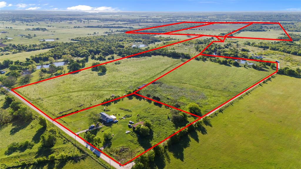 McHargue Legacy Ranch is a picturesque 458.686 acre ranch located approximately 12 miles SW of Corsicana, TX.  Property features a newly renovated 1,500 sq ft home with a green pasture view, and a 1,472 sq ft. barn.  
Excellent grazing pastures with 5 ponds nestled among stunning, mature wooded areas.  Winter Rye covers nearly 80% of the property proving forage for wildlife and cattle during winter. There is an abundance of pecan trees, including the twin 100+ year-old pecans in the cleared field, and springtime wildflowers.  The ranch is home to a variety of wildlife including abundant deer, turkey, hog, dove, and more. Some of the best low fence hunting in the area.
Cross fencing is in place, with large working pens that include squeeze shoot and head gate.  Water is plumbed to the livestock holding pen.  This property is an exceptional opportunity for those seeking a ranch with premier recreational, hunting and which is cattle ready.