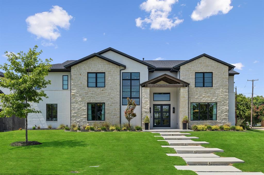 Welcome to a magnificent transitional home on a corner lot across from Northaven Trail in Preston Hollow. This property features timeless brick and stone accents, large windows, and a spacious open floor plan with high ceilings and hardwood floors. The main level boasts a gourmet kitchen with high end SS appliances, a walk-in pantry, a wet bar, and a center island, seamlessly flowing into a family room that overlooks a covered patio and sparkling pool. The custom woodwork library and glass wine room add a touch of elegance. The first floor includes a primary suite with a sitting area, a spa-like bath with a tub, an oversized shower, dual vanities, and a walk-in closet, along with a guest suite. The second floor has three ensuite bedrooms and an upgraded game and media room with a wet bar, beverage fridge, and built-in cabinets. Outdoors, enjoy a brand new pool with water features with custom marble surround. This home perfectly blends luxury, comfort, and functionality.