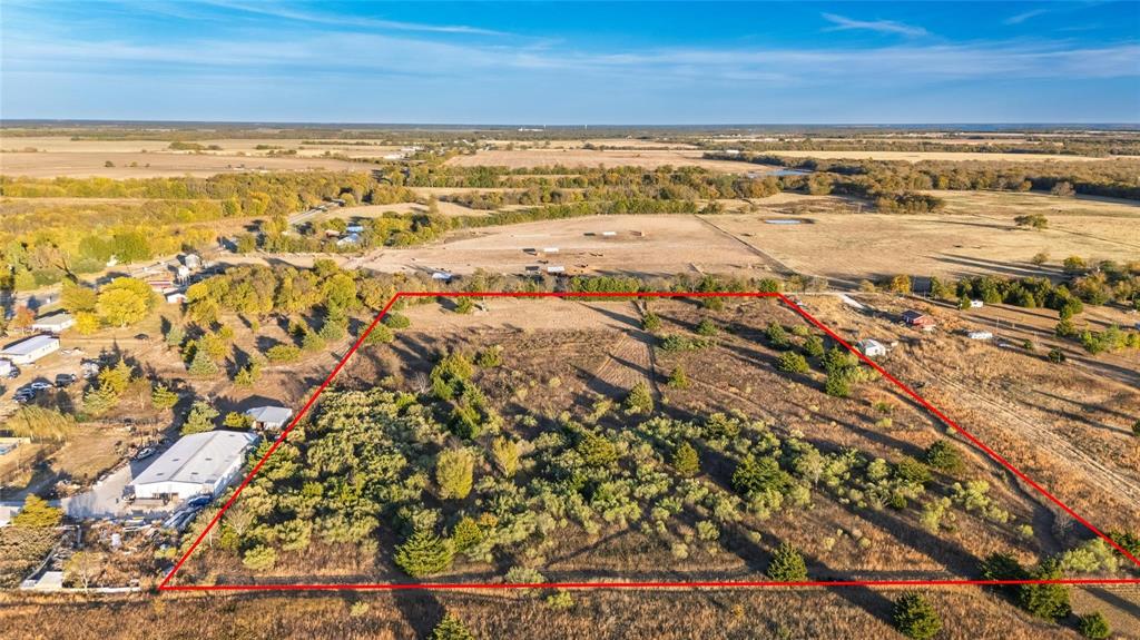 9.4 acres with the following amenities: no known restrictions, water meter (west Delta water, RV connections, aerobic system, 200 amp electric service panel FEC, small storage building with water and sewer connections, fenced and cross fenced, scattered trees and only about 3 miles to Cooper. Survey available. Ideal for a mobile home, RV or build your own home!!