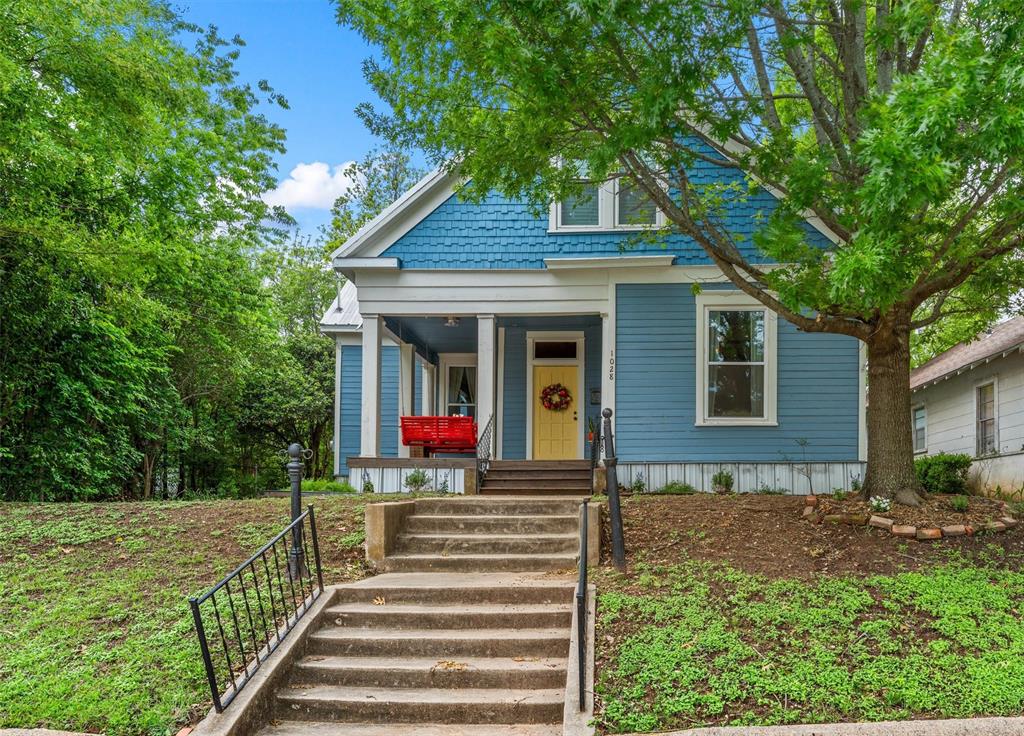 If these walls could talk, they’d tell over a century of stories—here's your chance to write the next chapter. Built circa 1910, this 4 bedroom, 3 bath gem just blocks from downtown Waco is full of soul, where original hardwood floors, historic details, and shiplap walls bring character you simply can’t recreate. Inside, you’ll find an inviting layout made for gathering. Downstairs offers flexibility with two living areas, a bedroom, two full baths, and a bonus space tucked off the bedroom—perfect for a home office or cozy retreat. The beautifully updated kitchen and bathrooms blend modern comfort with timeless charm, while the kitchen shines with modern appliances, a farmhouse sink, concrete countertops, and a breakfast bar. Upstairs, three oversized bedrooms and a full bath provide space for everyone. Mornings begin slow on the front porch swing with coffee in hand, while the spacious back deck sets the scene for dinner under the stars or easy evenings unwinding. Perfectly positioned just minutes from downtown shopping and dining, Baylor University, the Farmers Market, and Cameron Park—this location keeps you close to all the action. Lovingly known as the Blue Bird Inn, this home has been operating as a successful short-term rental and is being offered fully furnished. Whether you're stepping into homeownership, investing, or starting a new chapter, this one is full of charm and opportunity.