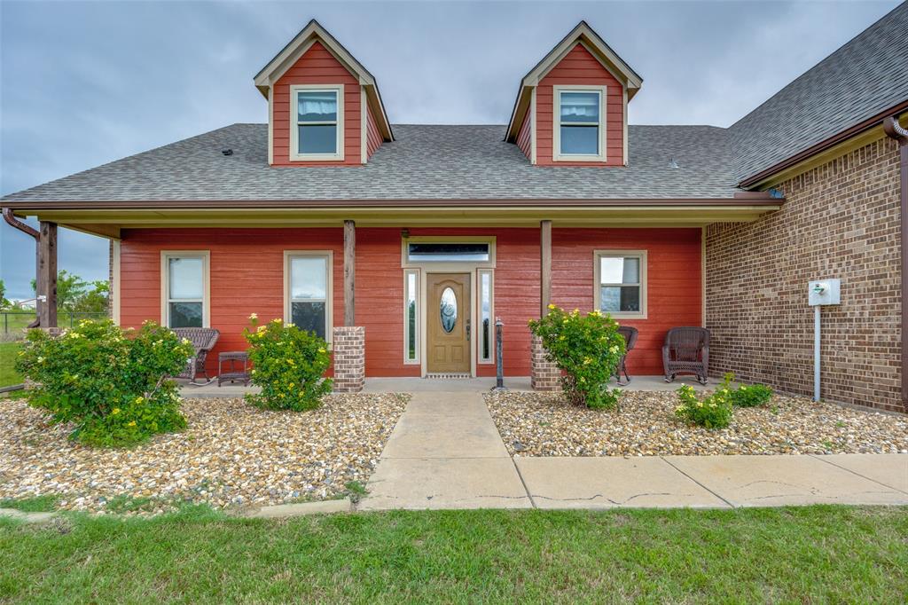 With motivated sellers open to creating opportunity for buyers and a beautiful home, this one is truly an opportunity you do not want to miss!
Tucked away in a country setting with gently rolling terrain and wide-open pastures, this custom-built home on 1.58 acres offers a rare opportunity to enjoy refined country living with no HOA restrictions.
Blending rustic charm with elevated comfort, this thoughtfully designed home features quality finishes throughout, including striking wood beams, extensive wood flooring, and a stunning remote controlled stone fireplace. The gourmet kitchen and beautifully finished baths feature granite countertops and vanities, stainless steel appliances, and rich knotty alder cabinetry.
Energy-efficient features such as foam insulation and a tankless hot water heater add everyday comfort and value. Spacious bedrooms provide flexibility for family, guests, or work-from-home needs, while the second level offers an impressive mother-in-law suite or private guest retreat complete with a generous bedroom, full bath, wet bar with island, sink, dishwasher, and abundant closet storage.
Outside, the property continues to impress with a long concrete driveway leading to a 24' x 30' metal outbuilding, ideal for hobbies, storage, equipment, or workspace. The extended pergola creates the perfect setting for outdoor seating, entertaining, and enjoying the peaceful surroundings. Additional highlights include a fully sprinklered yard, recently replaced roof shingles, a recently replaced HVAC condensing unit, and a replaced septic pump aerator.
Homes offering this much land, flexibility, quality, and privacy are hard to find. Do not miss your chance to experience peaceful country living with room to breathe, relax, and create lasting memories. Schedule your private tour today before this one is gone!

Discounted rate options and no lender fee future refinancing may be available for qualified buyers of this home.