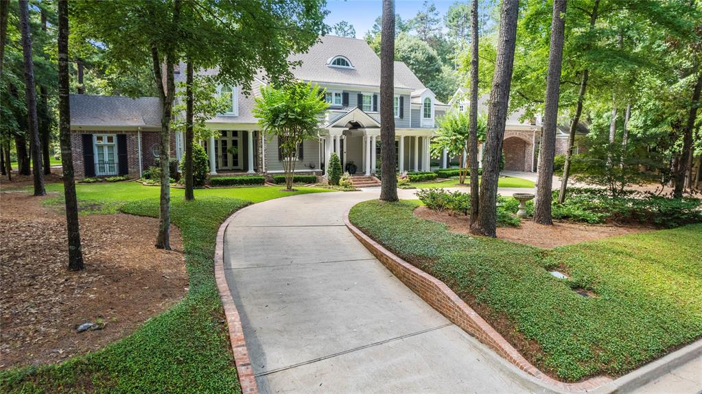 Indulge in a storybook life in this meticulously updated 5BD-5.5BA Cape Cod home within Brighton Creek's gates. Traditional charm meets modern elegance with a grand foyer, formal rooms for entertaining, and immaculate interiors featuring New England pine hardwood and Carrara marble countertops. The chef's kitchen boasts premium appliances and custom cabinetry. The main floor hosts a luxurious primary suite with a marble-clad bathroom. Upstairs, discover guest suites and a seating area with a wet bar. An oversized laundry room adds convenience. Step into the outdoor oasis with a cabana, kitchen, dining, living area, full bathroom, pool, hot tub, and lush landscaping. Outdoor speakers create the perfect ambiance for entertaining. Updates include new flooring, paint, custom cabinetry, remodeled bathrooms, a new roof, complete home generator, security and sound system. Mature trees balance open spaces, providing a park-like setting. Secluded, private, and luxurious - your ideal retreat!