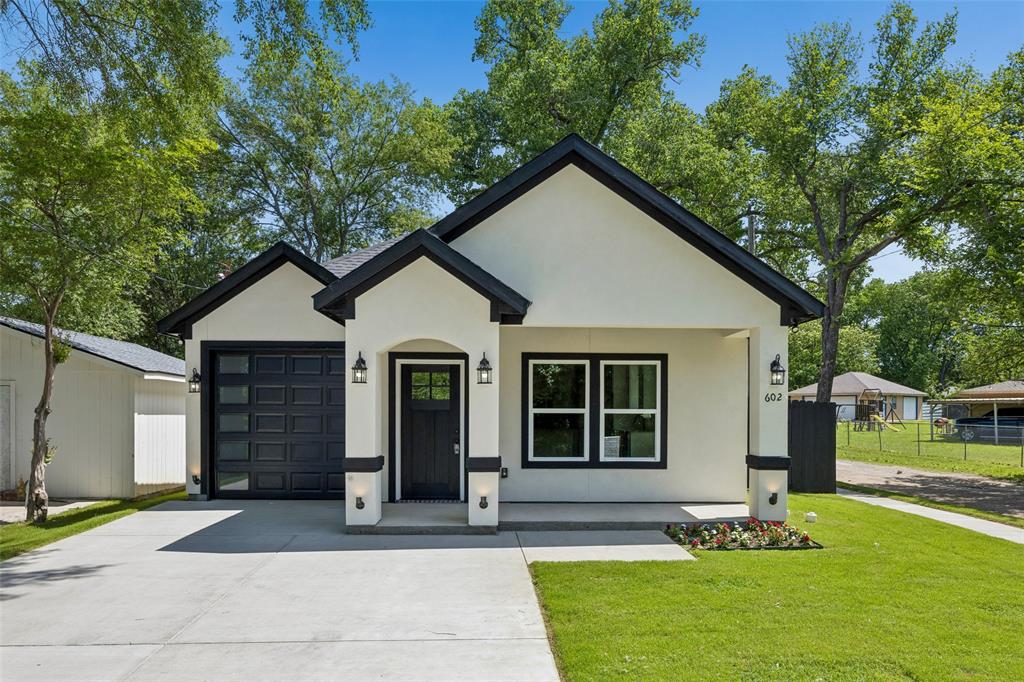 Welcome to this beautifully crafted new construction home in Terrell, Texas, perfectly situated on a desirable corner lot on W Newton Street. This thoughtfully designed 3-bedroom, 2-bath residence blends modern style with everyday functionality. The home’s striking stucco exterior offers clean lines and lasting curb appeal, setting it apart from the rest. Inside, you’ll find an open-concept layout filled with natural light, creating a warm and inviting atmosphere ideal for both relaxing and entertaining. The spacious living area flows seamlessly into a contemporary kitchen featuring sleek finishes, ample cabinetry, and a convenient dining space. Situated on a corner lot, the property provides extra outdoor space and added privacy, with plenty of room for landscaping, gatherings, or future family gatherings. Conveniently located with easy access to local amenities, schools, and major roadways, this home combines comfort, style, and practicality in a growing community.