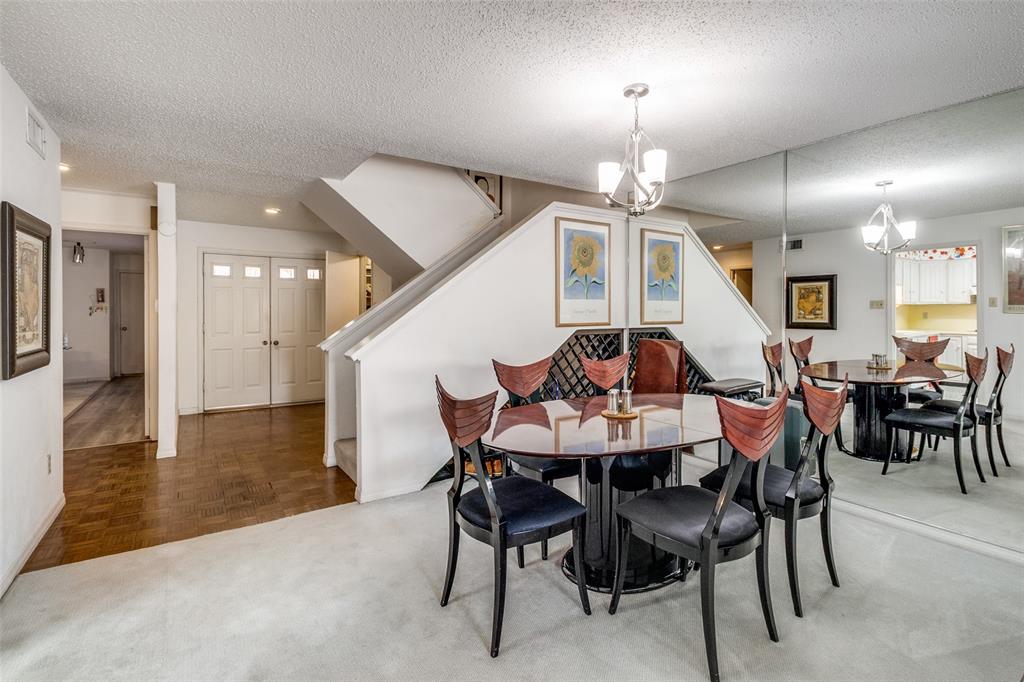 0.7 miles to Valley View (search for Valley View and the Dallas Mavericks). You get current and future entertainment access without the congestion of being in the immediate entertainment district. This thoughtfully designed, spacious, and ideally located townhome is ready for an owner or renter. Oversized rooms without wasted space, two-car garage, and an intuitive floorplan make daily living comfortable. The well-maintained interior is genuinely move-in ready, while - thoughtful updates - will significantly increase the property’s aesthetic appeal. If you've enjoyed shows like Fixer Upper, you know how rewarding putting your personal touch on a home can be. Both upstairs bedrooms feature full ensuite bathrooms and highly useful closets. Walk-in shower in Primary. This tucked away neighborhood with a single point of entry affords close proximity to functional and convenient amenities! Professionally maintained exteriors preserve the neighborhood’s timeless look, while American flags fly proudly throughout the neighborhood. The community features an expansive multi-acre greenbelt (perfect for enjoyable, soft-on-the-feet dog walks), a convenient clubhouse for gatherings, a genuinely swimmable pool, and tennis courts. Butterflies and hummingbirds pollinate the abundant foliage, while dragonflies patrol for the unwanted. The mature Live Oak, Japanese Maple, and Crape Myrtle provide shade and extravagant color throughout the year. You’ll be next to multimillion dollar homes, at a fraction of the price. Bring your imagination to update this well-maintained fantastic deal in the best kept oasis in Dallas.