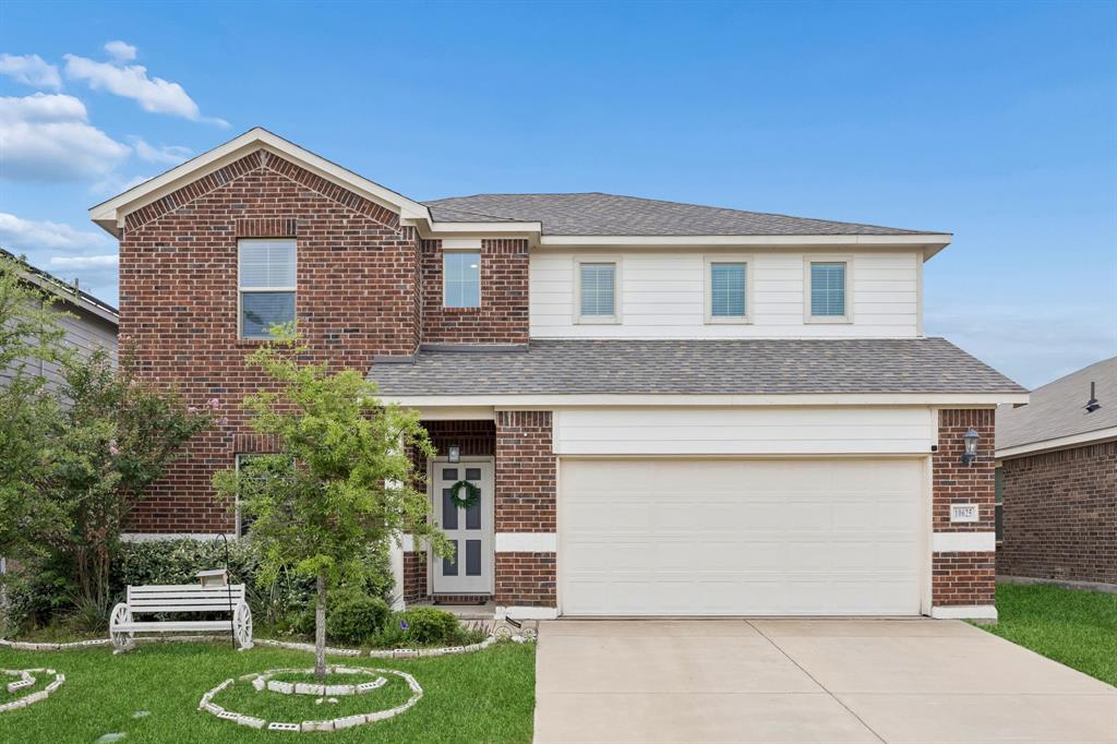 This move-in ready 5-bedroom, 3.5-bath residence at 10625 High Ridge Lane offers an exceptional new construction alternative, combining 2,997 square feet of contemporary living space with the distinct advantages of an established Fort Worth neighborhood. Located near Interstate 30 and Chapel Creek Boulevard, this property provides convenient access to major employment centers, downtown Fort Worth, and highly rated local schools. The open-concept layout features a seamless flow, high ceilings, and expansive windows that fill the interior with abundant natural light. Serving as the central hub of the home, the gourmet kitchen is equipped with premium stainless steel appliances, a large island, generous cabinetry, and casual bar seating. The main-floor primary suite serves as a quiet retreat, showcasing updated tilework, dual sinks, and a spacious walk-in closet. A rare secondary main-floor bedroom and adjacent full bathroom offer a flexible setup for a dedicated work from home office, guest accommodations, or multi-purpose use. Upstairs, 3 additional bedrooms flank a versatile game room suited for media, recreation, or a secondary living space. Recent interior updates include new downstairs flooring and modern tile selections across all bathrooms. Positioned on a beautifully proportioned lot with manicured landscaping, this property stands out against newer developments by offering completed upgrades, a spacious yard, and immediate proximity to local shopping, dining, and outdoor recreation.