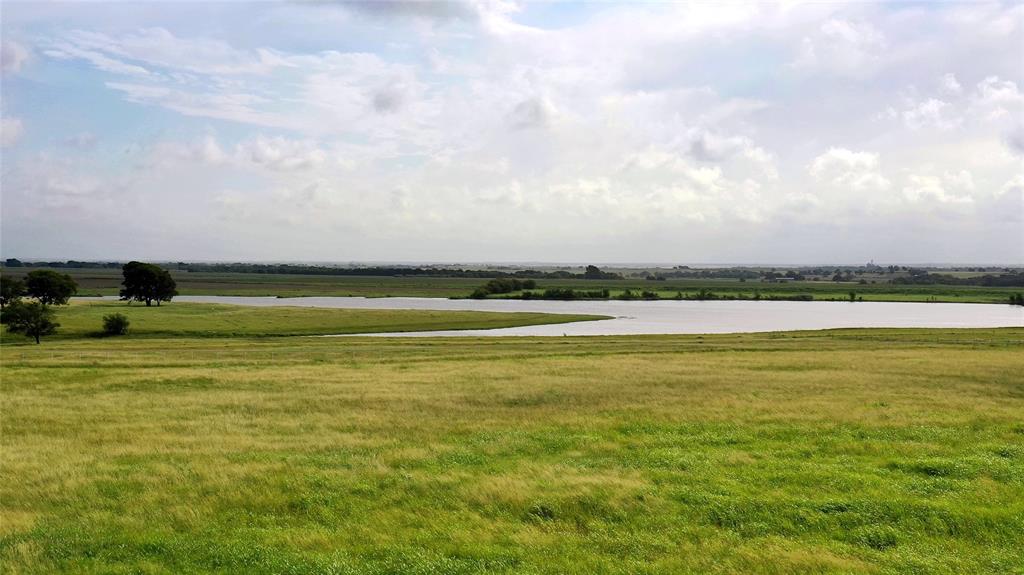 Looking for room to relax just outside Hillsboro and minutes from I-35? This 200+ acre ranch gives you space, water, and real Texas views. The 25-acre lake is the centerpiece—great for fishing, quiet mornings, launching a boat, or building your dream home overlooking the lake. There’s also a 1.5-acre pond, just right for an afternoon break or watering livestock.

Horse lovers will appreciate the white pipe fencing around the dedicated turnout area, while the 60x40 barn is built for work and comfort with two 12’ drive through roll up doors, four horse stalls, two with their own turnout, and a spacious overhang for keeping equipment and trailers out of the weather. The barn even includes a one-bedroom, one-bath suite—perfect for a guest, family member, or ranch hand. The main home (1,814 square feet) features three bedrooms and two bathrooms, with plenty of windows to let in views of your pastures and water. Good roadways make it easy to move around the ranch, from the barn to the lake and everywhere in between.

About 65 acres are currently in cultivation (or easily converted to coastal), bringing in passive income each year. The rest of the property is set up for horses and cattle—just as it’s been for the last 20+ years in the family. If you want a property that’s ready for horses, cattle, fishing, and plenty of quiet evenings, come take a look. This place is ready to be a part of your next chapter just outside Hillsboro. Give us a call to set up a tour and see what makes this ranch special.