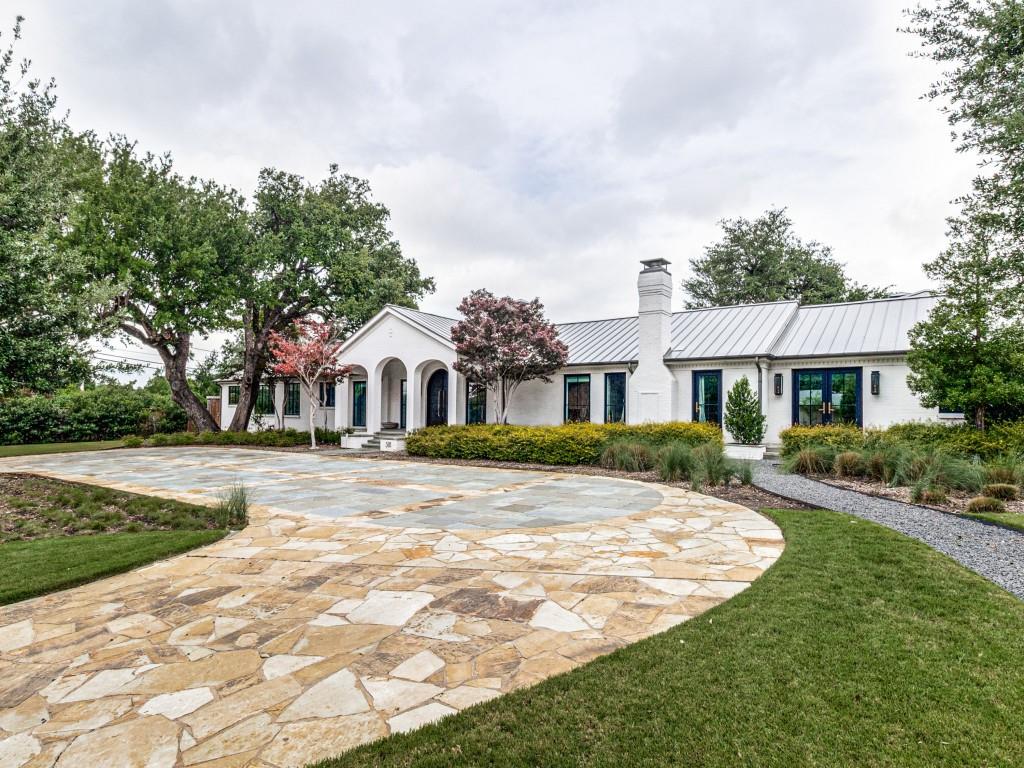 In one of Dallas’ most coveted neighborhoods, this Preston Hollow sprawling estate masterfully reimagined by Barringer Homes includes seamless indoor-outdoor living. The gourmet kitchen is anchored by top-of-the-line appliances, custom cabinetry, and a walk-in prep kitchen perfect for discreet event catering. A sophisticated butler’s pantry and bar bridges the culinary spaces to the dining areas, making grand-scale entertaining effortless.
 
The expansive floor plan features 6 bedrooms and 8 bathrooms, highlighted by a magnificent first-floor primary bedroom with soaring ceilings, windows overlooking the pool, a spa-inspired bathroom, and a custom closet.  Four bedrooms are on the first floor and two additional bedrooms are located on the second floor, including ensuite bathrooms and closets. A spectacular covered patio is equipped with phantom screens, heaters, and a gas fireplace. The patio overlooks a resort-style pool, spa, and a massive, beautifully manicured lawn. This estate leaves no detail overlooked, featuring a full-home backup generator, an LG Styler steam machine in the utility room and neighborhood patrol officer.