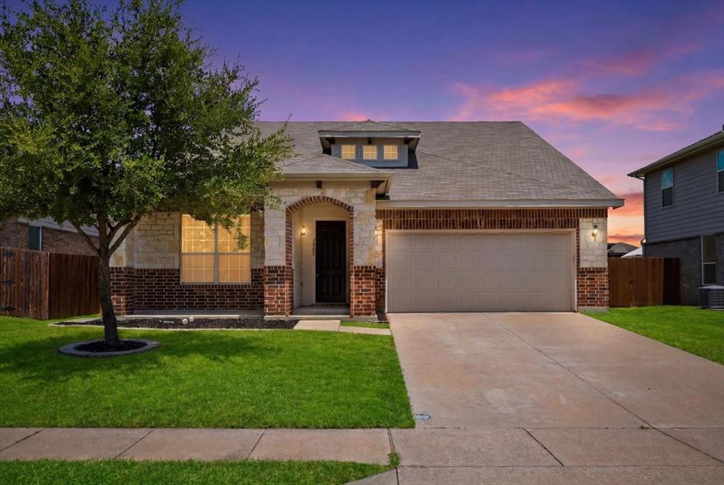 Located in the Big Bear Creek Meadows subdivision and zoned to Keller ISD, this well-maintained 4-bedroom, 3-bathroom home offers 2,647 square feet with a functional two-story floor plan. The roof was replaced approximately four years ago, including updated box vents. The open-concept kitchen overlooks the spacious living room and features a large island, pantry, built-in microwave, electric range, dishwasher, and garbage disposal. The first floor includes the primary suite with a walk-in closet and ensuite bath featuring a soaking tub and separate walk-in shower, along with two additional bedrooms and a full hall bathroom. Upstairs offers a spacious family room, a fourth bedroom, and a full bathroom, creating a flexible space for guests, a game room, media room, or home office. Enjoy the covered back patio overlooking the privacy-fenced backyard and the convenience of an attached two-car garage.