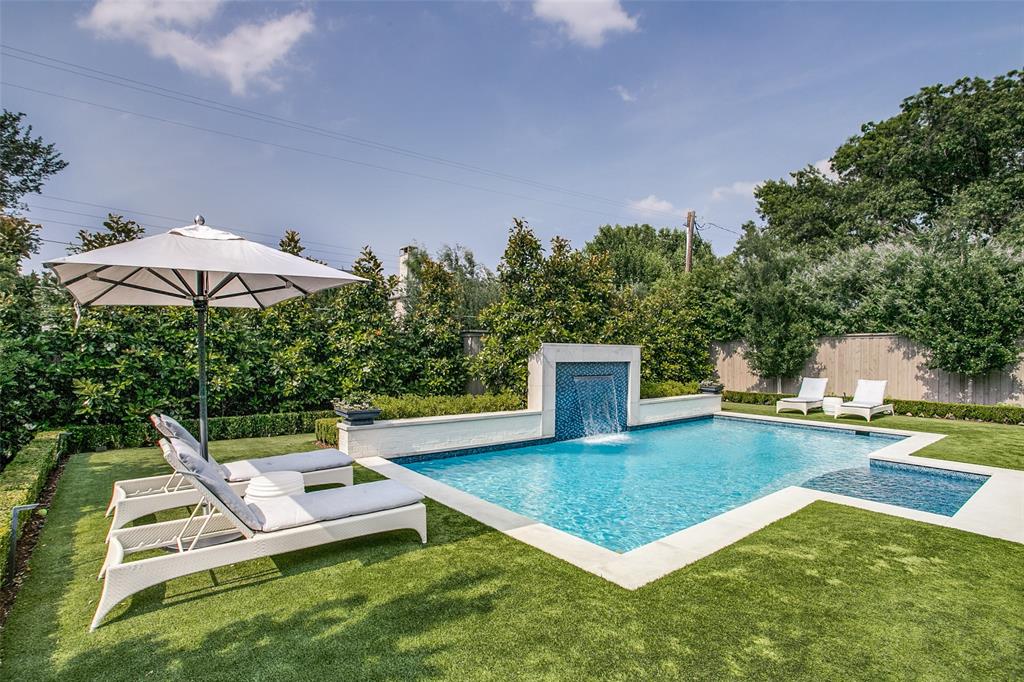 Completed in 2020, this pristine and stunning home has been substantially upgraded since that time. Open and generous living-kitchen areas feature views of a backyard that is truly spectacular. Designed by DDLA and created by Pool Environments in 2021, it features a 15 X 36 pool with an LED-lit waterfall feature, limestone coping and low maintenance artificial turf. Bluestone paved patio seating area fitted with a gas FP and Phantom mosquito screens, offers the perfect vantage point to enjoy the backyard ambiance. Inside, a wet bar with Scotsman ice-maker and a double door wine fridge services the entertaining space. Kitchen suite of appliances incl Asko, Subzero and Wolf. 1st floor primary suite with a palatial master bath is finished in white marble. 4 addt'l ensuite bedrooms with marble baths up. Separate grilling patio with EVO flattop grilling station and Lynx 36-inch BBQ grill with searing station and Lynxfridge. Too many enhancements to note. See TransactionDesk for more detail.