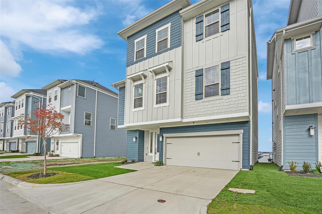 $79,000 REDUCED for quick sale Beautiful LAKEFRONT home is nested in the Sapphire Bay Community on Lake Ray Hubbard. This breathtaking home features  3 stories, each story has  it own balcony for you to to enjoy the lake in the backyard with anything that you can imagine. First story with the office that has the window looking out to the lake which will help you work very comfortable and productive. Second story with the open space between the living room and the large kitchen and dining. The third story has a master bedroom and 2 other bedroom. The house is very bright, the color is very invited, you will see the lake in every room. This lakeside living is perfect for entertaining, relaxing with the view, the wind, the water, the sound of the lake...This is a must see home and own it.