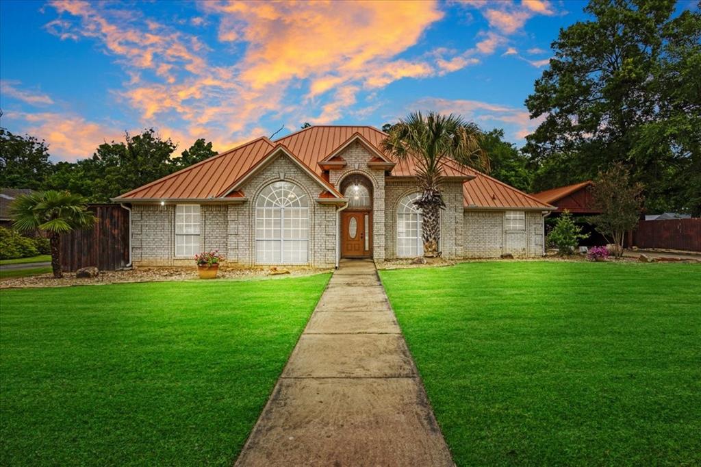 Beautifully maintained home in a quiet neighborhood conveniently located near NW Loop 286 and Hwy 82W, providing quick access to shopping, dining, schools, and all the amenities Paris has to offer.

Inside, you’ll find 2,326 square feet of living space featuring 4 bedrooms, 2.5 baths, a breakfast area, large living room with wood burning fireplace, and a separate dining room. The kitchen is a standout with granite countertops, soft-close cabinetry, and plenty of space for cooking and gathering.

Step outside to your own private backyard oasis designed for relaxing and entertaining, complete with stunning stonework, fire pits, built-in waterfall, and a spa room featuring a 5-person sauna and hot tub. Additional highlights include a 50-year metal roof, 17kw remote-start Generac generator, 15-person underground storm shelter, and an impressive 924 square-foot cedar carport. Ample storage space available outside as well.
Properties with this combination of amenities, functionality, and outdoor living rarely come available — schedule your showing today!  All information is deemed reliable but is not guaranteed and should be independently verified by the buyer's agent and buyer.