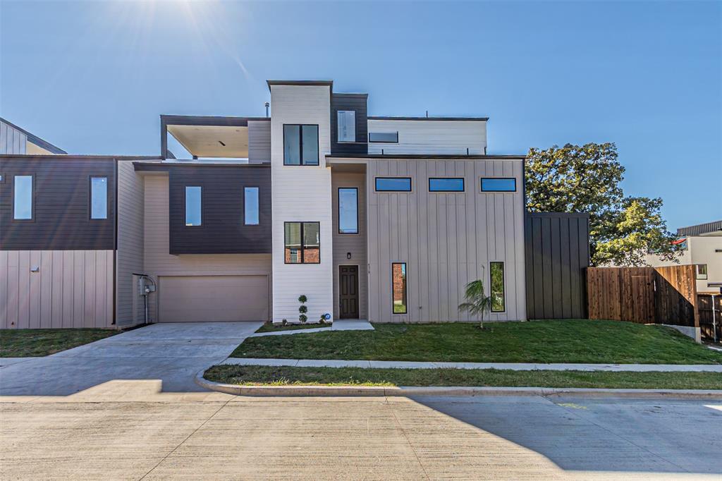 $50K PRICE REDUCTION!
An incredible opportunity to own this beautiful, move-in ready home at an exceptional value.
Experience modern luxury at its finest in this newly built 2026 duplex ideally situated between Uptown and the Medical District in the heart of Dallas. This sleek three-story residence blends transitional architecture with refined finishes, just minutes from Oak Lawn, Downtown, and the Design District.

The open-concept first floor features a chef’s gourmet kitchen with quartz countertops, custom cabinetry, a waterfall island, and stainless steel appliances. The spacious living room anchored by a large modern fireplace flows seamlessly into a private fenced backyard, perfect for relaxing or entertaining.

Upstairs, the primary suite boasts a private balcony with stunning city views, a spa-like bathroom with a freestanding tub and porcelain tile, and a generous walk-in closet. A second living space and two additional bedrooms, a hall bath, and laundry room complete the second floor. The third floor offers a large game room, half bath, and rooftop balcony with unmatched skyline views, an entertainer’s dream.

With proximity to Uptown, the Medical District, Old Parkland, the NTTA, I-35, and DART Market Station, this transitioning neighborhood promises exceptional growth and convenience. Discover the perfect balance of design, location, and lifestyle in this architectural gem.