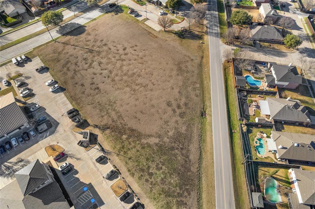 Position your business for success at 5800 Rowlett Road in the heart of Rowlett, one of the fastest-growing communities in the DFW metroplex. This 1.95-acre commercial tract offers exceptional visibility, strong surrounding retail synergy, and flexible development potential.
Zoned C-2 Commercial, this property allows for a wide range of commercial uses including retail, professional office, medical office, daycare, restaurant, personal services, and neighborhood-serving businesses. The C-2 designation within the City of Rowlett is intended to accommodate general commercial development, making it ideal for freestanding retail, multi-tenant strip centers, medical or dental clinics, childcare facilities, and service-oriented establishments. Developers also have the opportunity to construct a standalone building or a small neighborhood retail center (subject to site plan approval and city requirements).
Strategically located near Highway 66 with traffic counts exceeding 32,000 vehicles per day, the site benefits from excellent accessibility and high daily exposure. Monument signage along Rowlett Road enhances visibility and branding opportunities. Cross-access throughout the shopping center further improves traffic flow and customer convenience.
Whether you are an investor looking to develop a high-demand commercial asset or a business owner seeking a prime location in a growing submarket, this 1.95-acre C-2 zoned tract offers flexibility, visibility, and long-term upside in a well-established retail environment.
An outstanding opportunity to secure a premium commercial site in Rowlett’s expanding retail corridor.