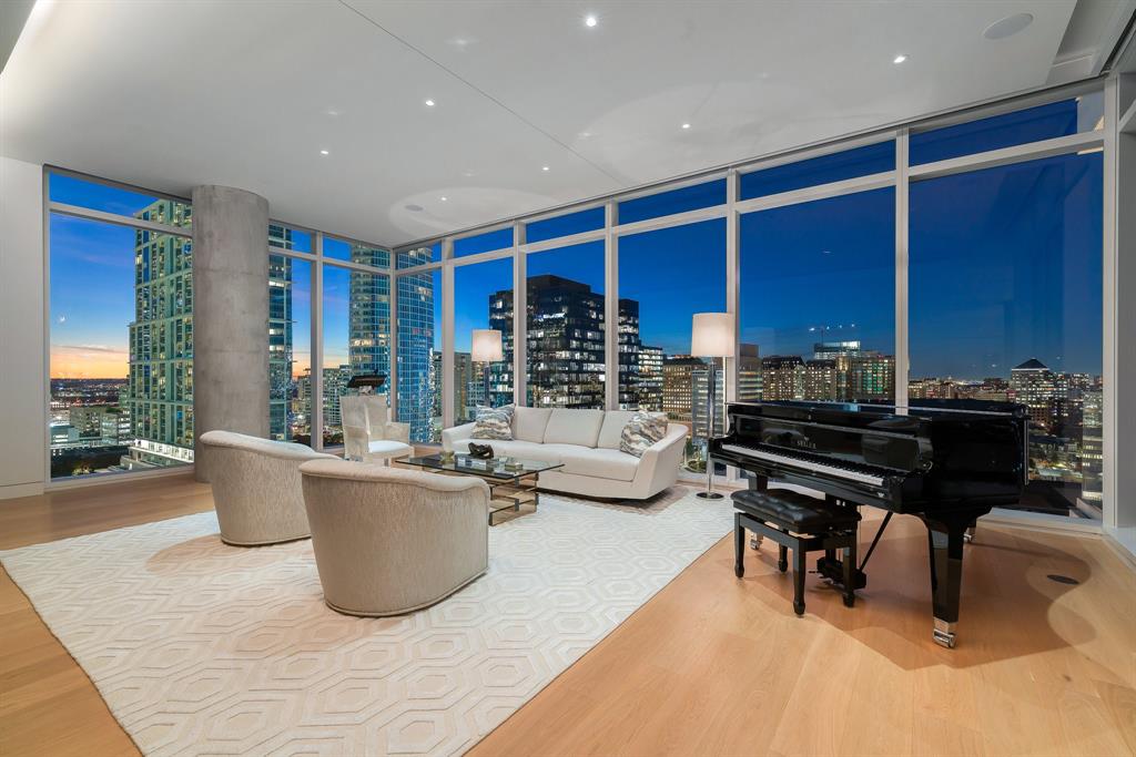 Experience unparalleled luxury and breathtaking views in this exceptional 3-bedroom residence at Hall Arts Residences, nestled in the heart of Dallas' vibrant Arts District. This sophisticated home is defined by its refined design and high-end finishes, featuring soaring 11' floor-to-ceiling windows, a Bulthaup kitchen with Gaggenau appliances, an Eggersmann custom closet, and Dornbracht fixtures throughout. Lutron shades add an extra touch of convenience and style, completing this one-of-a-kind living experience. Enjoy a comprehensive suite of amenities, including 247 valet service, on-site concierge, a resort-inspired pool and spa, a state-of-the-art fitness studio, and a pet-friendly dog park with grooming facilities. For outdoor enthusiasts and entertainers, there’s a putting green, multiple indoor and outdoor kitchens with grilling areas, and numerous spaces for hosting guests. This is a truly exceptional address offering a lifestyle of elegance, convenience, and comfort. 
This home offers 3 parking spaces: P2-#264 and #265, P3-#334. Storage unit P1-#224