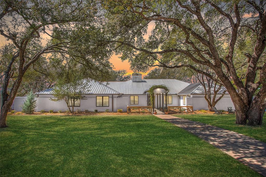 Tucked away on one of the most sought-after streets in 76109, 3701 Encanto is a 5 bedroom, 4.5 bathroom showplace that has to be seen in person to be believed. Sitting on the bluff side of the street at just under an acre, this gorgeous estate lot is expansive and impressive, featuring a sparkling pool and spa. The single-story residence, built in 2000, was completely remodeled in 2019 with the help of a prominent local Designer. Every modern convenience was considered in this transformation and the property is unlike anything on the market. Truly spectacular!