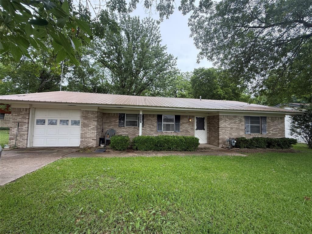 Great investment opportunity in the heart of Petty! This charming 2-bedroom, 1-bath home offers a spacious living room, a cozy kitchen, and a quaint dining area full of character. Sitting on approximately half an acre, the property features a beautiful piece of land with plenty of room to enjoy the outdoors. The home also includes a 1-car garage and tons of potential for a fixer-upper, starter home, or rental investment. With a little vision and creativity, this property could truly shine.