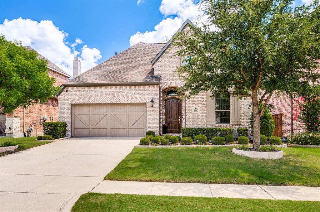 Nestled within the exclusive Melton Ridge village of Stonebridge Ranch, this meticulously maintained, single-owner Shaddock custom home offers exceptional craftsmanship, timeless style, and modern amenities. The desirable north-facing, one-and-a-half-story floor plan features 4 bedrooms, 3.5 baths, a private study, a game room, and an upstairs bedroom with ensuite bath, making it ideal for multigenerational living or long-term guests. Luxury finishes include rich hardwood floors, extensive crown molding and baseboards, premium hardware, Delta fixtures, wood blinds, walk-in closets, and recessed LED lighting. A dedicated fiber-optic connection, CAT6 and coaxial wiring, plus in-wall media connections provide outstanding connectivity throughout. A striking fireplace anchors the open-concept living area and flows seamlessly into formal and casual dining spaces filled with natural light. The kitchen features an island, granite countertops, glazed subway tile backsplash, under-cabinet lighting, pantry, GE Profile appliances including a gas cooktop, double ovens, built-in microwave, furniture-style vent hood, Bosch dishwasher, and Samsung refrigerator. The spacious primary suite offers a vaulted ceiling and a spa-inspired bath with a seamless glass shower, garden tub, dual vanities, and separate walk-in closets. A secluded study and oversized utility room pre-plumbed for a wash basin enhance everyday functionality. Additional highlights include a garage with epoxy flooring, insulated garage doors, mudroom, covered patio pre-plumbed for natural gas, expansive backyard, and professionally landscaped grounds with a full irrigation system featuring drip lines and bubblers. Major updates include a 2019 roof and 2025 water heater. A rare opportunity to own an exceptionally appointed custom home in one of McKinney's most sought-after master-planned communities, offering outstanding amenities, exemplary schools, and convenient access to shopping, dining, and major thoroughfares.