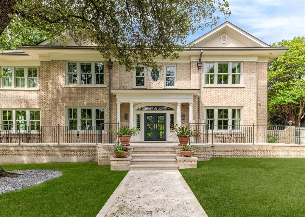 Poised on Lakeside Drive overlooking Turtle Creek, this urban sanctuary is zoned to the coveted Highland Park Independent School District.  This distinguished residence stands as one of the neighborhood's most enduring architectural treasures - a century-old estate masterfully reimagined for contemporary life.  An exhaustive restoration, completed from 2020–2022, preserved the home's storied character while infusing every inch of the property for today’s modern lifestyle.  A gracious entrance foyer sets an immediate tone of elegance, flowing effortlessly into formal living and dining rooms appointed with wide-plank white oak floors and exquisite plaster millwork. A handsome private study overlooks the lush, private backyard.  
Five generously proportioned en suite bedrooms offer serene retreats for family and guests, while a versatile third-floor flex room provides space for a studio, media room, or additional lounge. A beautifully appointed guest suite with full bath above the three-car garage offers privacy for guests or an additional living space. The enchanting grounds include a side courtyard centered on a classic fountain, while the secluded rear grounds reveal a koi pond, mature landscaping, and a dedicated greenhouse.  All three floors of the home are accessible by elevator.  
4211 Lakeside was originally designed by renowned French architect Harre M. Bernet and built by S.J. Churchill in 1922.
The renovation included new electrical, plumbing, roof, HVAC, doors, and windows.