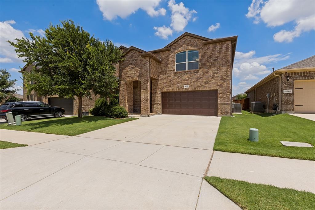 Price REDUCTION! 8 minutes from Texas Motor Speedway & Tanger Outlets. Welcome to this well-maintained 4-bedroom, 3.5-bath two-story home in Northwest ISD located in the Fairways of Champions Circle community. This spacious floor plan offers an open-concept design with laminate flooring throughout the main living areas and abundant natural light. The kitchen features granite countertops, stainless steel appliances, a large island with breakfast bar, walk-in pantry, ample cabinet space, and upgraded single-basin sink. It flows seamlessly into the dining area and living room, creating an ideal layout for everyday living and entertaining. The primary suite is on the first floor and includes dual vanities, a garden tub, separate shower, and a large walk-in closet. A dedicated office on the main level offers flexibility for remote work, study, or additional dining space. Upstairs features three secondary bedrooms, two full baths, and expansive game room. Each bedroom includes a ceiling fan for added comfort. Recent updates include laminate flooring replacing previous carpet in the downstairs living areas, a barn-style door between the primary bedroom and bath, and smart home enhancements including Z-wave Smart switches installed throughout the house and smart front door lock compatible with common platforms. The Smart House Hub is run by Home Assistant. The garage includes insulated doors and a professionally installed Mitsubishi mini-split HVAC system providing heating, cooling, and de-humidification. Additional improvements include LED garage lighting, gutters, and extra smoke detectors in the garage and attic areas. A Ring security system with doorbell camera, exterior cameras, and monitored doors and windows will convey. The backyard includes a covered patio with ceiling fan and lighting. Community amenities include a pool and playground, with convenient access to shopping, dining, golf, Hwy 114, and I-35W. Survey available. More info under documents.