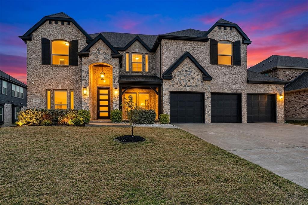 Discover exceptional quality and thoughtful design in this 2023-built First Texas home, perfectly positioned on a premium cul-de-sac lot in Garland's sought-after Herons Bay Estates. Just moments from Lake Ray Hubbard, this 5-bedroom, 4 bathroom residence sits on an oversized 0.34-acre lot, offering a rare sense of privacy with a protected preserve area on the street.

The interior impresses with a dramatic winding staircase, soaring 18-foot ceiling, and an open-concept living space ideal for modern living and entertaining. The main level features a luxurious primary suite with an upgraded oversized shower, dual vanities, and a spacious closet. A dedicated home office and a convenient full hall bathroom on the first floor provides valuable flexibility.

Upgrades abound in this meticulously planned home. The gourmet kitchen is the heart of the home, while the upstairs media room, complete with a theatre system that conveys with the property, is perfect for cinematic experiences. The owner’s thoughtful additions include a whole-house salt water system, a tankless water heater, central vacuum, and pre-wired speakers throughout the interior and extending to the covered patio. (see owners addition feature sheet in MLS)

The expansive backyard offers a private canvas for a future pool or outdoor oasis. This home's functionality is completed by the highly desirable third-car garage—an upgrade from the builder's original plan. Located within the Garland ISD with easy access to major highways, shopping, and dining, this home offers a truly turn-key lifestyle.