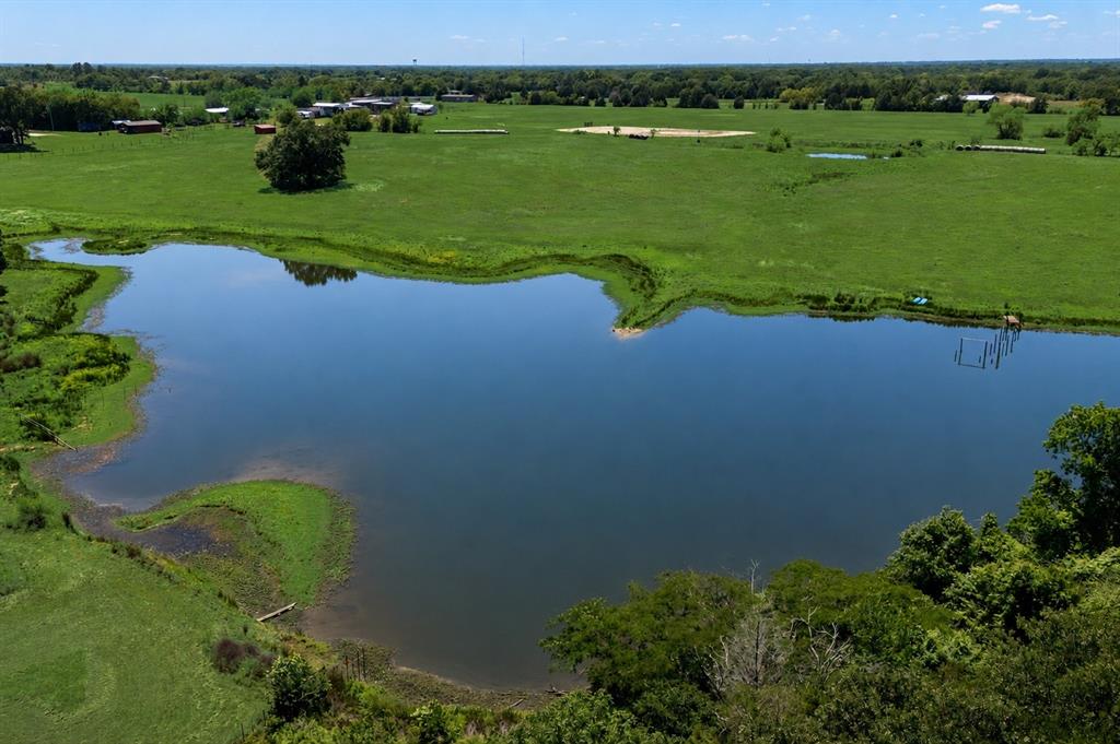 Beautiful 10 acre tract ( two adjacent 5 acre. lots) 180k for both in highly desirable Eustace with endless potential and gorgeous natural scenery. Located near Gun Barrel City and just minutes from Cedar Creek Lake, this unique property offers a rare combination of privacy, accessibility, and development opportunity.
The land features stunning mature cypress and evergreen trees, beautiful rolling topography, and a picturesque setting that backs up to a large private lake, creating incredible views and a peaceful atmosphere. Unlike many flat parcels, this property offers natural character and elevation changes that make it truly special.
A small portion near the front of the property has been lightly cleared to help envision a potential driveway entrance and homesite placement while still preserving the property's natural beauty and privacy. Property may require walking access depending on weather conditions.
Whether you are looking to build a private estate, create a family retreat, develop multiple homesites, or explore investment opportunities such as cabins or a boutique campground, this property offers exceptional flexibility.
Excellent road access with convenient proximity to shopping, dining, recreation, and lake living while still maintaining a peaceful country feel. Rare opportunity to own a scenic acreage tract in growing Henderson County.