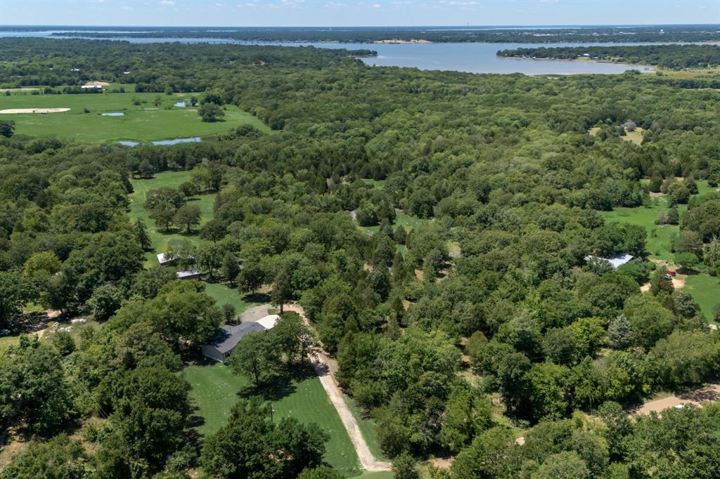 Beautiful 10 acre tract or two 5 acre. 135k each in highly desirable Eustace with endless potential and gorgeous natural scenery. Located near Gun Barrel City and just minutes from Cedar Creek Lake, this unique property offers a rare combination of privacy, accessibility, and development opportunity.
The land features stunning mature cypress and evergreen trees, beautiful rolling topography, and a picturesque setting that backs up to a large private lake, creating incredible views and a peaceful atmosphere. Unlike many flat parcels, this property offers natural character and elevation changes that make it truly special.
A small portion near the front of the property has been lightly cleared to help envision a potential driveway entrance and homesite placement while still preserving the property's natural beauty and privacy. Property may require walking access depending on weather conditions.
Whether you are looking to build a private estate, create a family retreat, develop multiple homesites, or explore investment opportunities such as cabins or a boutique campground, this property offers exceptional flexibility.
Excellent road access with convenient proximity to shopping, dining, recreation, and lake living while still maintaining a peaceful country feel. Rare opportunity to own a scenic acreage tract in growing Henderson County.
