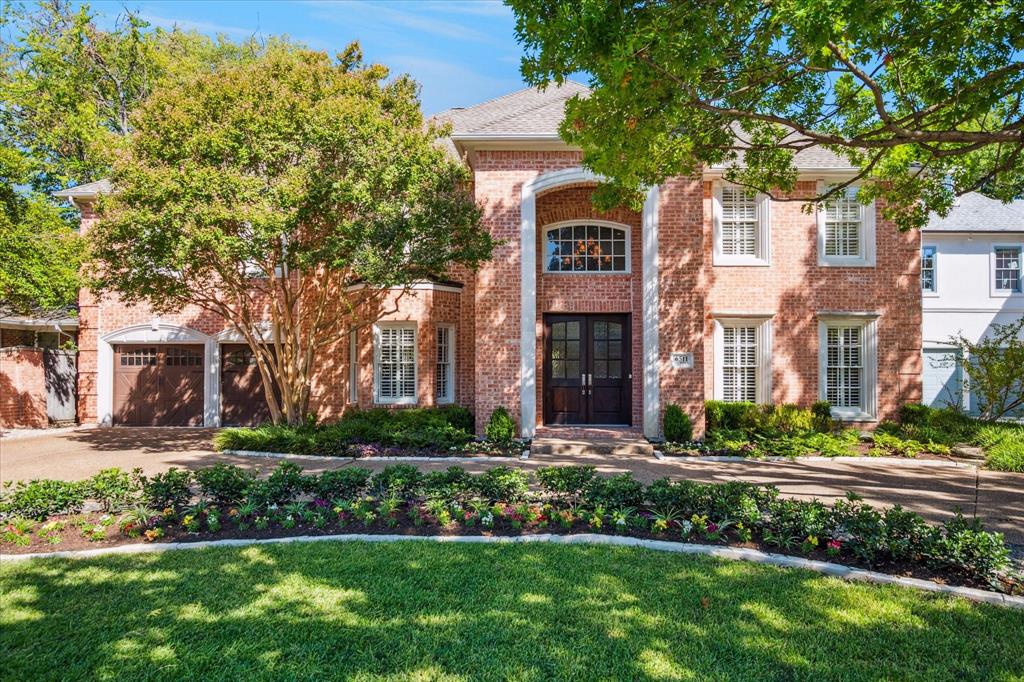 Contract fell through at no fault of the property. Situated in the heart of Preston Hollow, this warm and inviting home perfectly blends convenience with comfort. Spanning 5,172 square feet, this residence offers spacious and thoughtful living spaces perfect for the modern lifestyle and entertaining family and friends. The two-story entry is filled with natural light and welcomes you in with beautiful hardwood floors, tall ceilings, traditional moldings, and oversized formal living and dining spaces. An open floor plan across the back includes a fully equipped kitchen - complete with a center island, double ovens, bar seating, and abundant storage, an adjacent breakfast area, and large family room with fireplace and wall of windows overlooking the incredible outdoor entertaining spaces. The home also features a downstairs primary suite with a fireplace, his and her walk-in closets, and bath with double vanities, and separate shower and tub.  An additional downstairs flex room could be used as an office or additional living room. Upstairs features an open living or playroom area, three secondary en-suite bedrooms, and an amazing media room with wall of built-ins. The backyard continues to impress with a private oasis for relaxation and entertaining, including a covered patio, open patio, outdoor kitchen, stunning pool, and separate turfed yard area. Beautifully landscaped property with mature trees, an attached 2-car garage, expansive circular driveway, and traditional curb appeal make this home an opportunity not to miss!