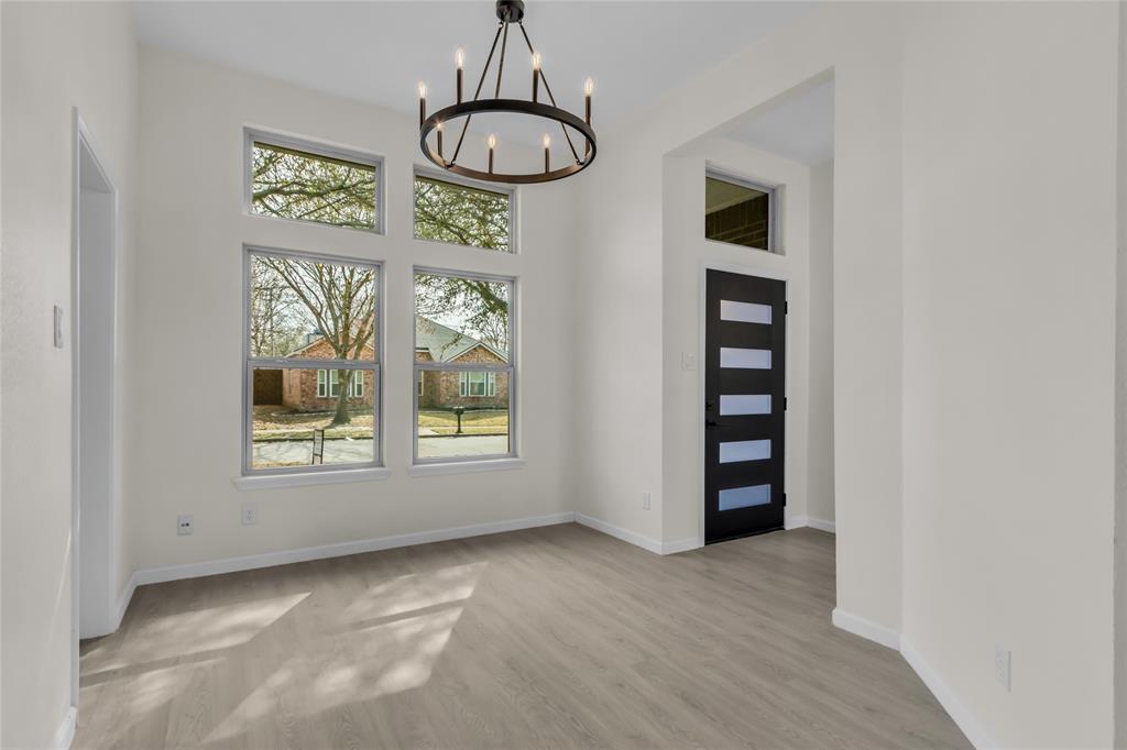 COMPLETELY RENOVATED & READY FOR QUICK MOVE IN! AMAZING LIST OF UPDATES, over $100,000 spent just in the past few months include Luxury Vinyl Plank in all living areas, beautiful front door! New cabinets in both baths & kitchen with corner deep reach lazy susan & pull out trash drawer! Light & bright kitchen, quartz countertops, single basin 11 inch deep sink, stainless appliances, 4 door Samsung French refrigerator just installed! More amazing features include decorator lights, fresh hardware, smooth ceilings, ceiling fans, switches, fresh paint in and out! Hi efficient tilt out vinyl windows, back door (blinds sealed in glass)! Great open floor plan, long box out window in breakfast room, 2nd pantry & vaulted to 11 ft in primary bedroom overlooking private large backyard! Since October 2025: Carrier HVAC, metal stairs to attic, roof & new fence! Great location close to 121 & 75 for quick easy access any direction! Great choices of restaurants & shopping nearby including the new Costco.