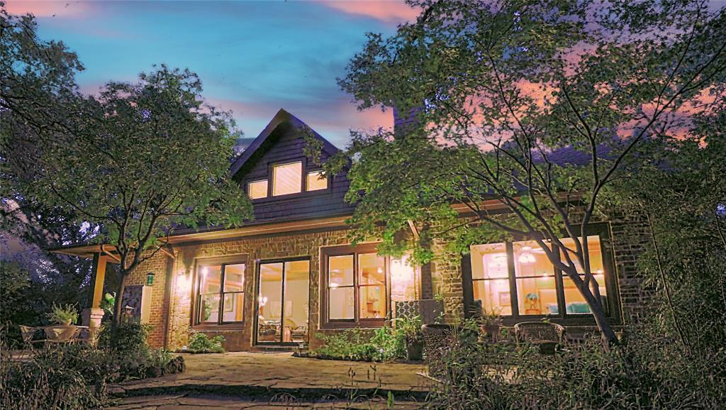 Enjoy life in this private, Lewisville Lake area biophilic design retreat home on 1.1 acres. Custom Craftsman w views located in a community adjoining the lake & Corp land w trails. High Performance home designed & built to Passive standards w durable, sustainable materials to save time, energy & money, providing comfort & safety during extreme weather. Pearl GOLD certification & Net Zero ready qualifying for an Energy Efficient Mortgage. Pier & Beam. Open Floor Plan. Easy to clean & maintain. Healthy Home chemical-free, natural flooring: .75 in. wood, granite, slate, marble & cork. Grand Eat-in-Kitchen, Commercial style built-in stainless appliances, butler pantry, breakfast bar, 48 in. upper cabinets, solid plywood framing & appliance garages. 2022 Projects completed: upstairs finishes, exterior painting, exterior & kitchen lighting, smoke detectors, new office w private entrance, remodeled laundry room & heat pump coil. Multi-generational friendly.  Visit this lifestyle home today.