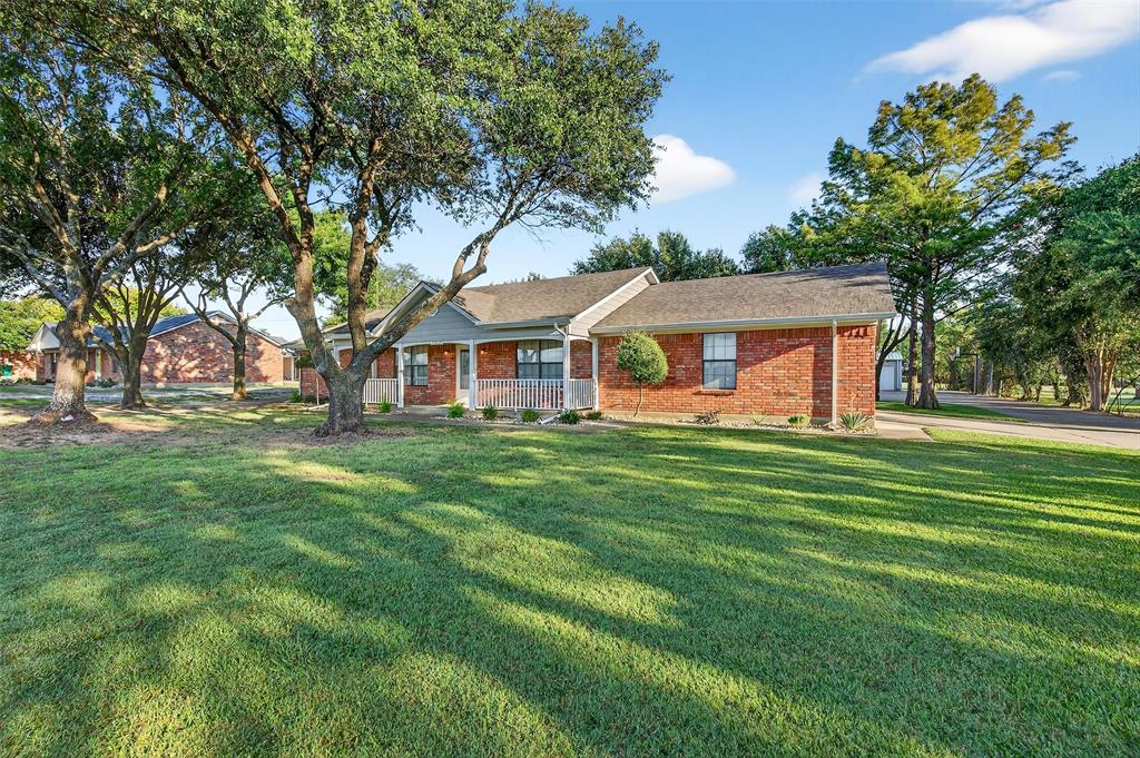 Completely Updated and ready to move in today!  Enjoy this 3 bed, 3 bath brick home located just 2.5 miles east of Whitesboro.  Fresh updates throughout with flooring, paint, countertops, bath remodel and more.  This property is for the outdoorsy family with a detached 3 car shop with bath and the 28x36 barn for all you toys or equipment. All this situated on 1.48 acres with trees, landscaping and concrete driveways to all building.  No expense spared here.