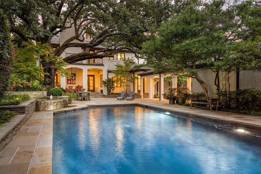 Set on a tree-lined street in coveted Greenway Parks, 5349 Drane is a timeless residence that has been thoughtfully renewed for modern living. Behind its classic façade, the home blends architectural charm with an impressive list of recent updates that elevate both comfort and function.

Gracious living and dining rooms, accented by four fireplaces, create inviting spaces for gathering. Natural light streams through brand-new windows, while updated ceiling lighting and custom hardwood floors bring a fresh sophistication to every level.

Outdoors, a beautifully renovated pool — recently dug to a nine-foot depth and surrounded by professional tree lighting — sets the stage for year-round entertaining.

Behind the scenes, the home is fully equipped for peace of mind with a whole-house and pool Kohler generator, multiple new HVAC systems with updated ductwork, and family-friendly electrical upgrades throughout.

A rare combination of timeless character and today’s modern essentials, this home offers an extraordinary lifestyle in one of Dallas’ most sought-after neighborhoods.