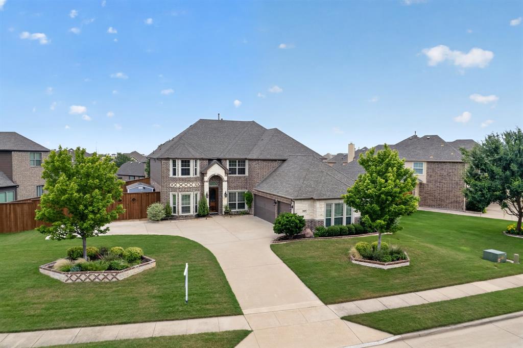 Beautifully updated home on oversized lot in Sachse’s highly sought-after Woodbridge community and “A” rated WylieISD School District , offering 4 bedrooms, 3.5 baths, a dedicated office, multiple living areas, and a flexible layout with room to spread out. Fresh interior paint, new
carpet with engineered wood flooring and herring bone tile upgrades along with great natural light give the home a clean and unique appeal. The main living area features soaring ceilings with a full height stone gas fireplace with electric start and an open flow into the kitchen and dining spaces. The kitchen includes granite countertops, stainless steel appliances, ample cabinetry, walk in pantry and plenty of workspace for everyday living or entertaining. The private primary suite is located downstairs with a spacious ensuite bath and large walk-in closet accessible to the laundry room with recently added built-in cabinets and stackable washer & dryer. Upstairs offers generously sized secondary bedrooms, Jack & Jill bathroom, additional living space with wet bar, and a flexible media room that can function as a game room, craft room, or playroom. Notable upgrades include a whole-house water softener connection, tankless water heater, updated HVAC units with anti-microbial UV lights, and HomePro entertainment wiring. Out back, enjoy a covered patio, newly stained 8-ft board-on-board privacy fence, 7 person hot tub, 8x12 storage shed and upgraded landscaping.  The 3-car garage includes diamond plate cabinetry and cooling fans and additional extended parking. Woodbridge amenities include 7 gated pools, parks, trails, playgrounds, and 18-hole golf course with club house restaurant all conveniently located to shopping, dining, and major commuter routes. Come see it today!
