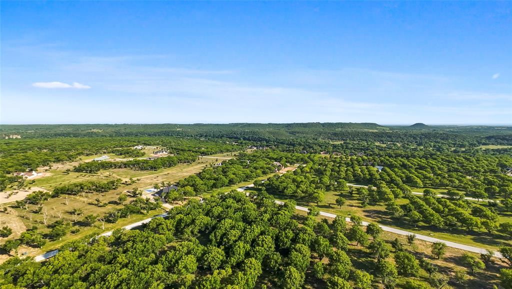 Incredible opportunity to own a nice piece of property in Pecan Plantation Landing east more than one acre, tree filled lot in the highly sought after aviation community. This space offers a great opportunity to design and build your dream home, along with space for so much more, Gated Pecan Plantation has amenities like tennis courts, swimming pools, river access, two golf courses, walking trail, a full service club house, and so much more!