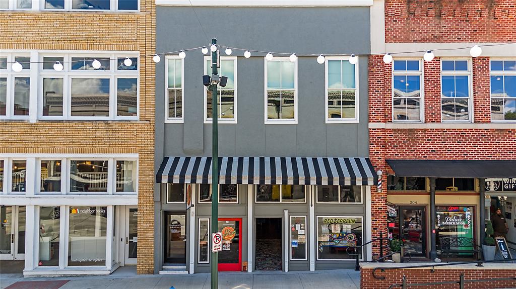 Rarely does such an opportunity make itself available. Welcome to 206 E. Louisiana St, mere steps from the bustling and Historic Downtown McKinney Square. Built in 1900 and providing modern amenities, the building's first floor contains nearly 2,000 SF of retail space, while the upstairs and back portion of the first floor contain rentable office space totaling 3,300 SF. There are 13 separate office spaces, a break room, and storage available for an owner to utilize or rent out. The retail space has a current NNN lease in effect through Sept 2025. Building highlights include proximity to McKinney Square, original wood floors throughout, vaulted ceilings and historic charm with updated plumbing, wiring, and HVAC units. This is an incredibly rare opportunity to own a retail building with exceptional character in the Historic Downtown McKinney Square! All square footage measurements are approximate. Please do not disturb tenants and retail business. Contact listing agent for all showings.