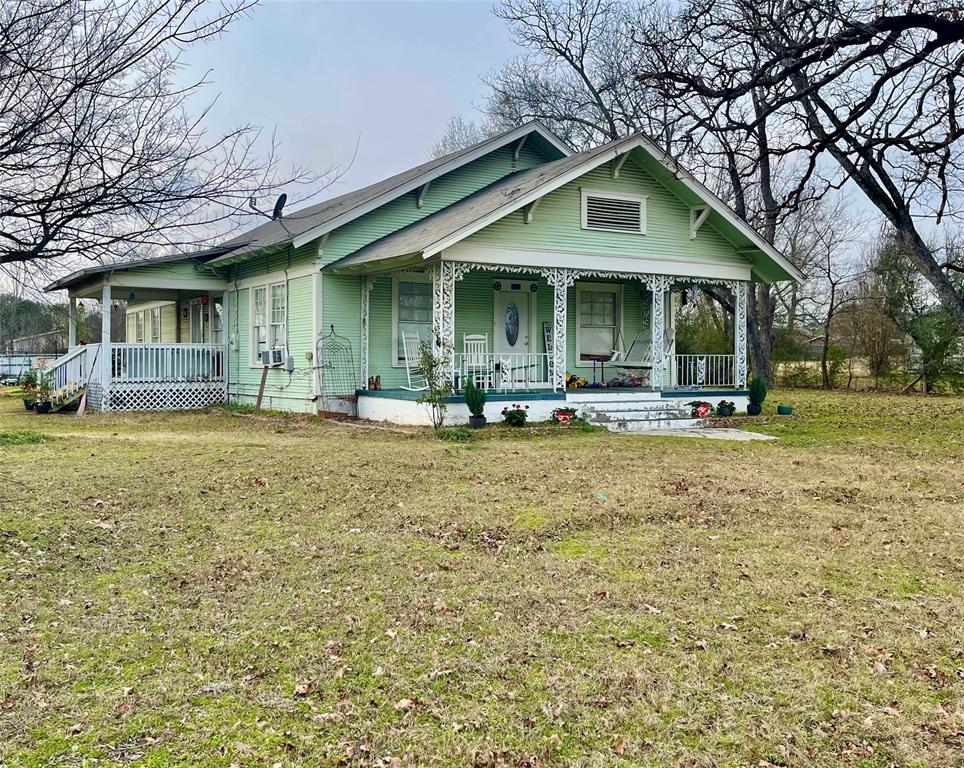 CHARMING FRAME ONE STORY TRADITIONAL ON MORE THAN ONE HALF ACRE LOT( .545 ) WITH NICE TREES VERY CLOSE TO GRAND SALINE SCHOOLS, PERFECT LOCATION  , 1620 SQUARE FEET, HIGH CEILINGS,  NICE SIZE LIVING ROOM, BEAUTIFUL LARGE  DINING ROOM WITH BIG WINDOWS , KITCHEN WITH LARGE PANTRY ROOM,  2 HUGE BEDROOMS, 3 BIG CLOSETS , 1 HUGE BATH, 2 CAR GARAGE, FULL LENGTH COVERED FRONT PORCH WITH SWING, GREAT BIG  BACK YARD ,  WOOD AND TILE FLOORS THROUGHOUT , HIGH CEILINGS, BIG ROOMS, FULL LAUNDRY ROOM,  GARAGE NEEDS WORK, NICE ATTIC SPACE ,  PLENTY OF PARKING 

*****BIG PLUS : CENTRAL AIR CONDITIONING IS NOT WORKING AND SELLER IS OFFERING BUYER  $8000 CASH  TOWARD COST OF REPAIR  AT CLOSING !!! *****