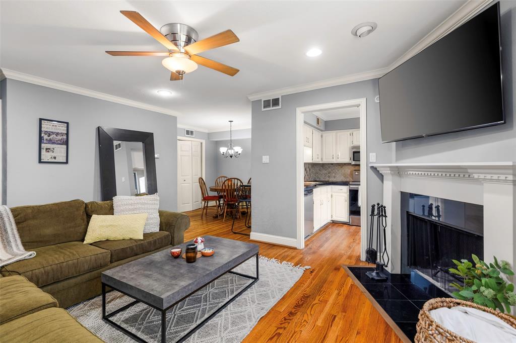Beautifully appointed one-bedroom, one-and-a-half-bath split-level condo in a gated community, ideally positioned in the heart of Dallas. The downstairs living area centers on a classic mantel fireplace with an open flow to the dining space and breakfast bar. The kitchen features custom white cabinetry, stainless appliances, and a travertine backsplash, along with a breakfast bar that looks onto the dining area and full size Washer and Dryer utility area — refrigerator, washer and dryer all convey with sale. Upstairs, the split-level design offers a versatile landing with built-in shelving, ideal as a reading nook or home office, and a generously scaled bedroom with an ensuite bath anchored by an extended stone-topped vanity. A private one-car garage underneath the unit adds secure parking or storage, with additional guest parking nearby. Situated just steps from the community pool and spa, and just off of Greenville Ave, this property has easy access to everything that Dallas does best. Drive to white rock lake, hop on the University Crossing Trail, or pop around Mockingbird Station; this property provides everything you would need, come schedule a tour at 4800 Northway #18A today! Contact agent or schedule through BrokerBay for access.