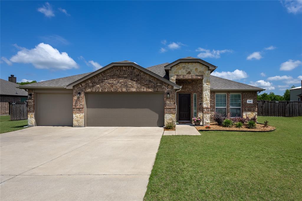 Enjoy the benefits of solar with peace of mind - seller will pay off panels at closing so buyer receives system free and clear! Welcome to your perfect blend of country charm and everyday convenience! This beautifully maintained 4-bedroom, 2-bath home sits on over half an acre in a peaceful, small neighborhood that offers room to breathe while keeping you just minutes from the amenities of town. Step inside to an inviting layout filled with natural light, generous living spaces, and thoughtfully designed bedrooms. The kitchen and main living area flow seamlessly, making daily life and entertaining a breeze. With energy-saving solar panels, you’ll enjoy modern efficiency and lower utility costs year-round. Outside is where this property truly shines. Whether you’re hosting gatherings, relaxing under the big Texas sky, or staying active, you’ll love the sprawling backyard complete with a private sport court—perfect for basketball, pickleball, and hours of fun. The oversized lot offers endless possibilities for gardening, play, or future projects. The garage is equipped with a 50amp breaker for RV hook up.  If you’re looking for rural charm without sacrificing proximity to shopping, dining, and commuting routes, this home delivers the best of both worlds. Don’t miss your chance to make it yours!