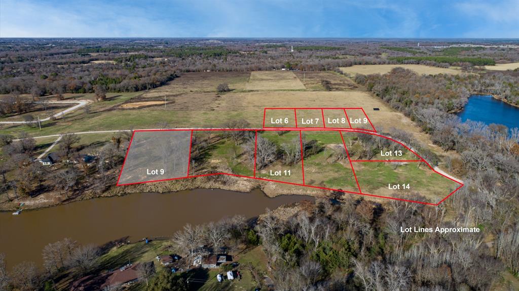 Waterfront lake lot with a perfect mixture of trees and open water views.