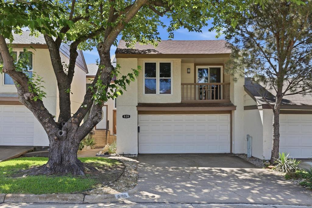 Updated townhome situated on a premium golf course lot with beautiful views and an unbeatable location! From the moment you enter, you will appreciate the inviting layout, natural light & updates throughout the home. The 1st level features a spacious family room with tile flooring, a stunning brick accent wall and a cozy fireplace. The family room is open to the dining area and is enhanced by a wall of windows and French doors overlooking the backyard, deck & golf course, providing incredible views & easy access for indoor and outdoor entertaining. The kitchen has been updated with granite countertops, painted cabinetry, stainless steel appliances, a deep single basin sink & an open design that connects perfectly to the second living area or den, creating flexible living space ideal for relaxing, entertaining or a home office. A separate laundry room is conveniently located just off the den, and a half bath is also located on the first floor. Upstairs you will find two secondary bedrooms overlooking the front of the home, including one with a private balcony. The guest bedrooms share a full bathroom with ample space for family or visitors. The oversized primary suite offers enough room for a sitting area along with large windows showcasing peaceful golf course views. The primary bathroom features updated cabinetry, granite countertops, modern fixtures and additional storage space. Step outside and enjoy your morning coffee or evening meals on the backyard deck overlooking the golf course. The wrought iron fenced yard includes a grassy area perfect for pets or gardening. Additional features include a two-car attached garage, HOA maintained front yard and common areas, plus access to a community clubhouse and pool. Conveniently located just minutes from Interstate 30, LBJ Freeway and Downtown Dallas.
