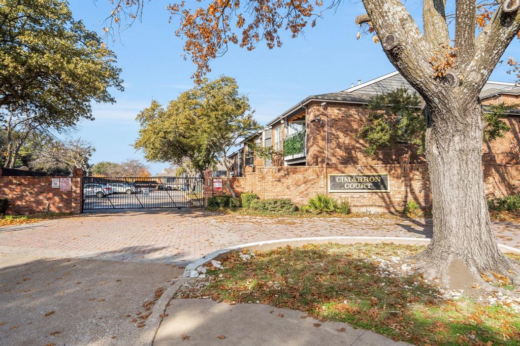 Charming 1-bedroom condo in gated Cimarron Court, ideally located in North Dallas. This upstairs unit features real hardwood floors throughout, a bright open living area with large windows, and a private balcony for outdoor relaxation. The kitchen offers abundant cabinet space, refrigerator included, and matching black appliances with dishwasher, range, and vent hood. The bathroom provides an extended vanity, ample storage, and a tub-shower combo. A stacked washer and dryer are also included, making this home truly move-in ready. Residents enjoy access to multiple community pools, gated entry, and assigned parking. Conveniently situated near major highways, shopping, dining, and entertainment, this property offers an excellent blend of comfort, convenience, and value—perfect for an owner-occupant or investor seeking a strong North Dallas location.