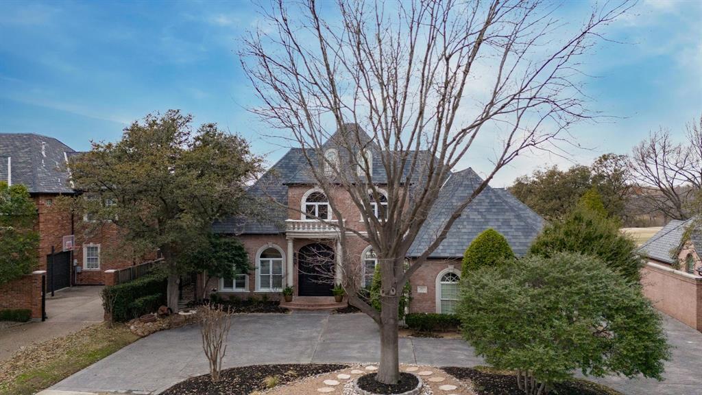 Enjoy breathtaking panoramic views from every room in this custom Balkman home situated on a premium golf course lot in sought after gated community! WIth an open concept floorpan, offering six bedrooms (two on the first floor), a private study with fireplace and wet bar, and a downstairs versatile media room, this home has it all! Flow seamlessly from the dining room to the gourmet chefs kitchen complete with top of the line stainless steel appliances, a large island and breakfast bar with plenty of seating! The great room features gorgeous woodwork and walls of windows overlooking the 12th hole on Gleneagles Country Club Queens Course! The downstairs media room, located just off the main areas, is complete with sliding doors that open up to the backyard paradise, perfect for the entertainer! The spacious outdoor living area features a built-in grill, refrigerator, stone fireplace, built-in heaters, electric screens, and built-in bar seating! Relax in the infinity pool and spa while overlooking the serene lake! Retreat to the primary suite with tranquil views, electric black out shades, and wood floors! The serene spa-like primary bath has been completed renovated with a gorgeous volcanic rock freestanding tub, steam-shower with multi-head functions, custom cabinetry, and an oversized walk-in closet! Upstairs has four ample sized secondary bedrooms, all with en-suite access to baths, and a 17 seer AC unit for extra efficiency! Additional features include a large walk-in storage room, a lifetime warranty on roof, circular drive for added parking and more!