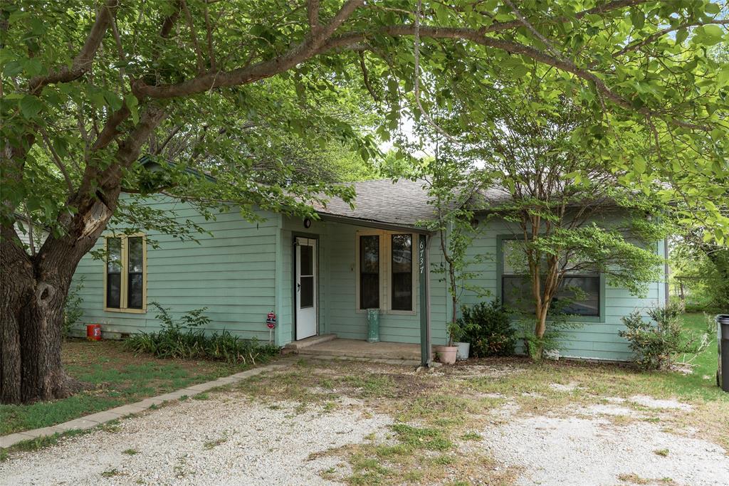 Light, bright, and full of potential in the heart of Lake Worth! This 2-bedroom, 1-bath home offers 1,325 square feet with a functional layout and multiple living that give the home a spacious feel. Situated on an oversized lot with mature trees. Detached 2-car garage (approx. 19x19) with power that would be perfect for a workshop, additional storage, or future customization. This home needs some TLC and is being sold AS IS — seller will not make repairs. Priced accordingly, this is a great opportunity for investors, DIY buyers, or anyone looking to add value and build equity.  Affordable entry point with strong upside, you don’t want to miss this one. Conveniently located just minutes from Lake Worth, major highways, shopping, and dining. Buyer will be responsible for a new survey if needed.
