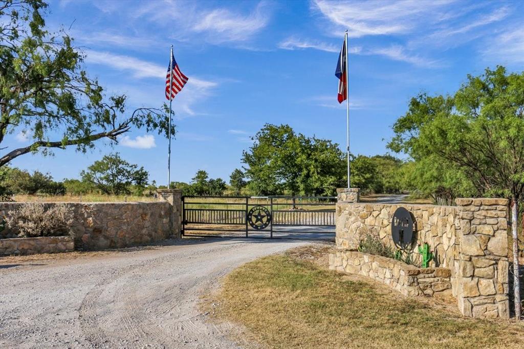 Introducing an exceptional opportunity to own a 95+acre ranch in Brown County, Texas with 2 homes, a guest house, and tons of extra amenities.  The land is high fenced on approximately 65 acres, with improved whitetail and blackbuck antelope.  There is another approximately 30 acres in the back of the property that is low fenced and open to native deer and turkey.  Located 2.5 hours from Austin and DFW, it makes a great weekend get-away, short term rental, corporate entertainment property, or permanent home place.  Imagine waking up to the breath-taking sunrises and savoring the serenity of the countryside, all while enjoying the modern comforts of three distinct homes.  Each residence boasts its own unique charm, ensuring that family and guests alike experience the epitome of comfort and luxury.  The property is accessed from a paved county road and sits back .4 miles down your own private road, offering peace, tranquility, and seclusion.  Schedule your private tour today.