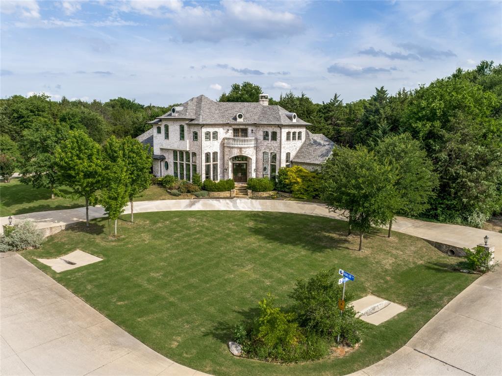 A truly exceptional estate set on a lush 1.5-acre corner lot within highly sought-after McKinney ISD — with NO city taxes!
This custom-built home offers the perfect balance of privacy, luxury, and convenience, just minutes from the charm of historic downtown McKinney. Nestled within an intimate acreage community, the property is surrounded by natural beauty, creating a peaceful retreat from the everyday.
Meticulously maintained and completely move-in ready, the home features a thoughtfully designed floor plan with seamless flow and optimal use of space. Highlights include rich hardwood flooring, soaring ceilings, and expansive walls of windows that flood the home with natural light while showcasing breathtaking views from every room.
Step outside into your own private resort-style oasis. The backyard is designed for both relaxation and entertaining, featuring an oversized covered outdoor living area, a stunning saltwater pool with a slide, an attached spa, and a fully equipped built-in grilling station. Infrared heaters and electric shades ensure year-round comfort and enjoyment.
The grounds are equally impressive, offering mature trees, a spacious grassy area for play, a seasonal vegetable garden, and exceptional privacy. A charming treehouse adds a unique and delightful touch.
A rare opportunity to own a serene, luxury property with unmatched outdoor living.
Property has interior and exterior cameras.