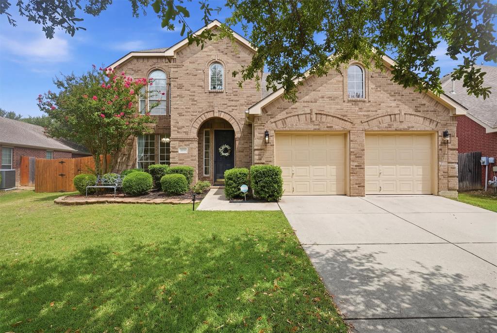 Welcome home to the highly sought-after Columbus Heights community, where you'll enjoy an active HOA that hosts events throughout the year and a neighborhood pool perfect for cooling off on warm Texas summer days.

Designed for both everyday living and effortless entertaining, this spacious home offers a light-filled open floor plan where the living, dining, and kitchen spaces flow seamlessly together. The beautifully updated kitchen is the heart of the home, featuring freshly painted cabinetry, a large butcher block island, abundant prep space, and views of the inviting family room with a cozy fireplace. Recently installed extended luxury vinyl plank flooring throughout the downstairs and updated light fixtures add a fresh, modern touch.

The private downstairs primary suite provides a peaceful retreat with room for a sitting area and a full king-size bedroom set. The spa-like ensuite bath includes a soaking tub, separate shower, and an oversized walk-in closet. A versatile front room offers endless possibilities as a formal dining room, home office, or flex space.

Upstairs, you'll find a spacious second living area, three generously sized bedrooms, and two full bathrooms. One bedroom includes its own private bath, making it ideal for guests, multigenerational living, or older children seeking additional privacy.

Outside, the oversized backyard is ready for entertaining with an expansive concrete patio offering plenty of room for outdoor dining, relaxing, or adding your dream gazebo. Additional peace of mind comes with a recently replaced roof, making this home as practical as it is beautiful.

With stylish updates, flexible living spaces, outstanding community amenities, and a welcoming neighborhood atmosphere, this move-in-ready home truly has it all.