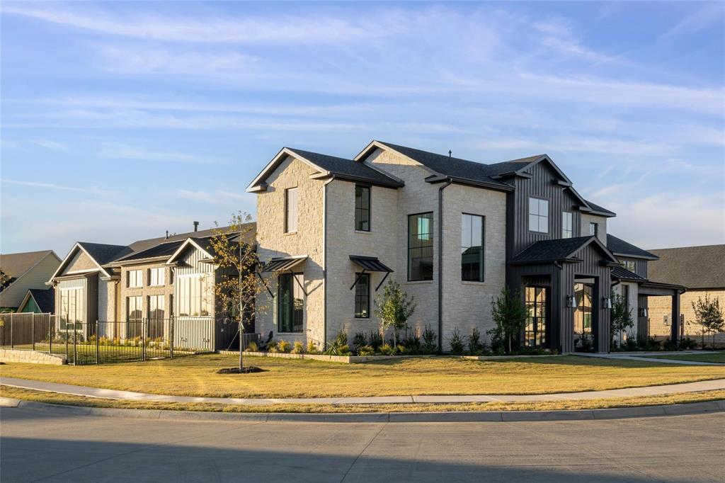 Built by Graham Hart Home Builder, this custom home perfectly blends contemporary sophistication with timeless farmhouse charm. Set on a corner lot in one of Colleyville’s most desirable neighborhoods—and zoned to highly acclaimed Grapevine-Colleyville ISD—this home offers the ideal combination of style, space, and location. With 4 bedrooms, 4.5 bathrooms, and 4,655 square feet, the thoughtfully designed layout includes soaring ceilings, expansive open-concept living spaces, and high-end finishes throughout. The chef’s kitchen is a showpiece with custom cabinetry, premium appliances, and an oversized island that flows effortlessly into the main living and dining areas—perfect for entertaining. The primary suite is a true retreat, featuring dual vanities, a freestanding soaking tub, and dual walk-in showers. Each secondary bedroom includes its own ensuite bath, ensuring comfort and privacy for all. Additional highlights include a walk-in pantry, dedicated home office, and seamless indoor-outdoor flow with room to build your dream backyard oasis. This is Colleyville luxury at its finest—with custom craftsmanship, an unbeatable location, and exceptional design all in one unforgettable home.