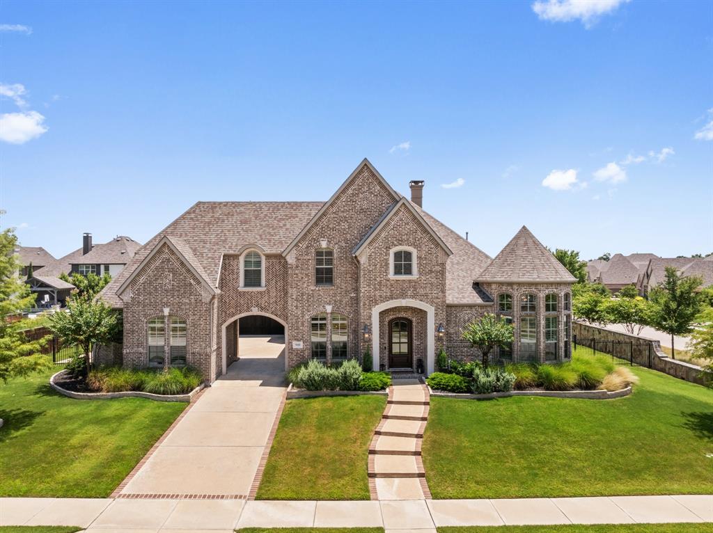 Nestled on a half acre corner lot in the desirable Whitley Place, this luxury home offers unparalleled living just steps from the highly acclaimed Cockrell Elementary. This home spans over 5,300 sq ft of open-concept living space, featuring 5 bedrooms, 4 full baths, and numerous living areas. The dream kitchen boasts leathered quartzite countertops, high-end appliances, a walk-in pantry, and ample storage. An oversized study, a media room with a wet bar, a huge game room, and a walk-in bar area with both a wine fridge and a beverage fridge. Designer lighting enhances the interior, with surround sound audio both inside and out, numerous oversized walk-in closets, and floor-to-ceiling windows that flood the home with natural light and offer views of the backyard oasis. Outdoors, travertine stone surrounds a sports pool, hot tub, fire pit, and an outdoor kitchen. There is plenty of green space for the kids, a 4-car garage, and a gated porte cochere entry. This magnificent home has it all!
