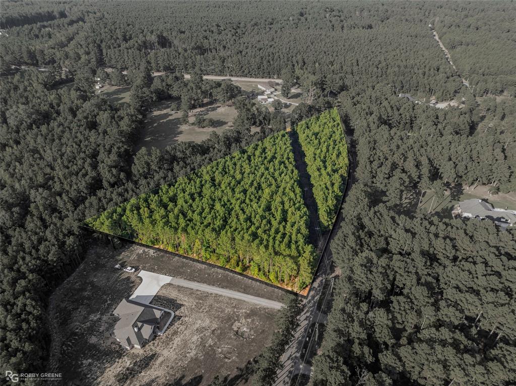 Discover the perfect canvas for your dream home at 190 Linton Bellevue Road in the highly desirable Benton, Louisiana. Spanning 4 acres (174,240 sq. ft.). Tucked among mature pine and hardwood trees, the property provides a natural backdrop that ensures peace, privacy, and endless design possibilities for your future residence. This parcel is approved for residential use and ready for construction, making it ideal for those seeking to build a custom estate tailored to their lifestyle. With ample space, you’ll have the freedom to create not only your perfect home but also the outdoor amenities you’ve always wanted—whether it’s a pool, garden, workshop, or entertainment space. The property’s shape and layout maximize usable land while preserving a wooded buffer from neighboring homes. Utilities are readily accessible, helping streamline the building process. The surrounding area features elegant custom homes on spacious lots, ensuring that your investment is supported by a well-established, upscale neighborhood atmosphere. Located just minutes from Benton schools, dining, shopping, and recreational amenities, this land blends the best of both worlds—secluded country living with quick access to modern conveniences. Easy access to major roadways also makes commuting into Bossier City, Shreveport, or surrounding areas a breeze. Call and schedule your showing today!